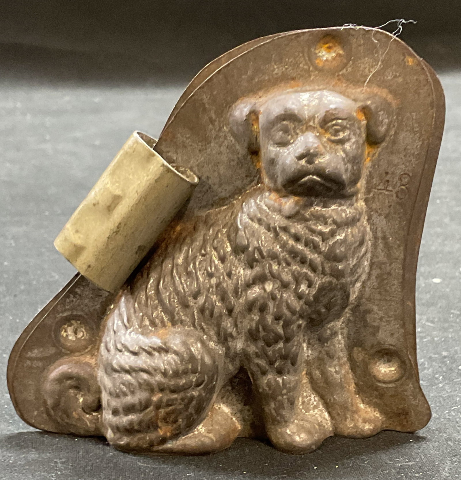 TC Weygandt Dog Chocolate Mold, Germany: Vintage T. C. Weygandt chocolate mold. Dog motif. Signed on metal. Made in Germany. Measures approx 3.5 x 3.25 x 1 inches. Wear including scratching and patina. Tc Weygandt chocolate mold, chocolate m