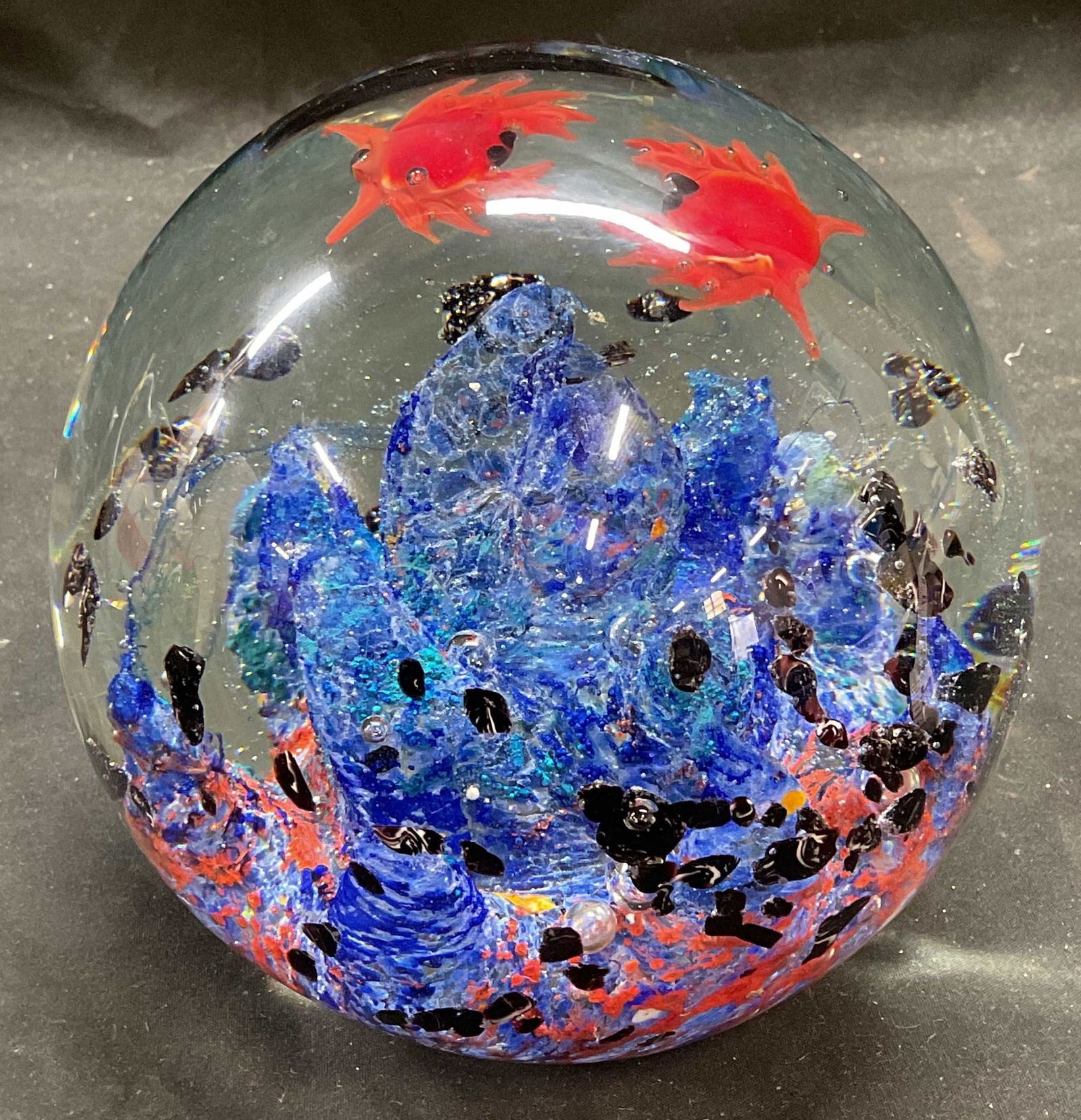Hand Blown Art Glass Aquarium Paperweight: Hand blown art glass aquarium paperweight. Blue coral and crab motif. Measures approx 5 x 5 inches. Piece is heavy. Some wear consistent with exposure. Art glass paperweight, aquarium paperweight, cra