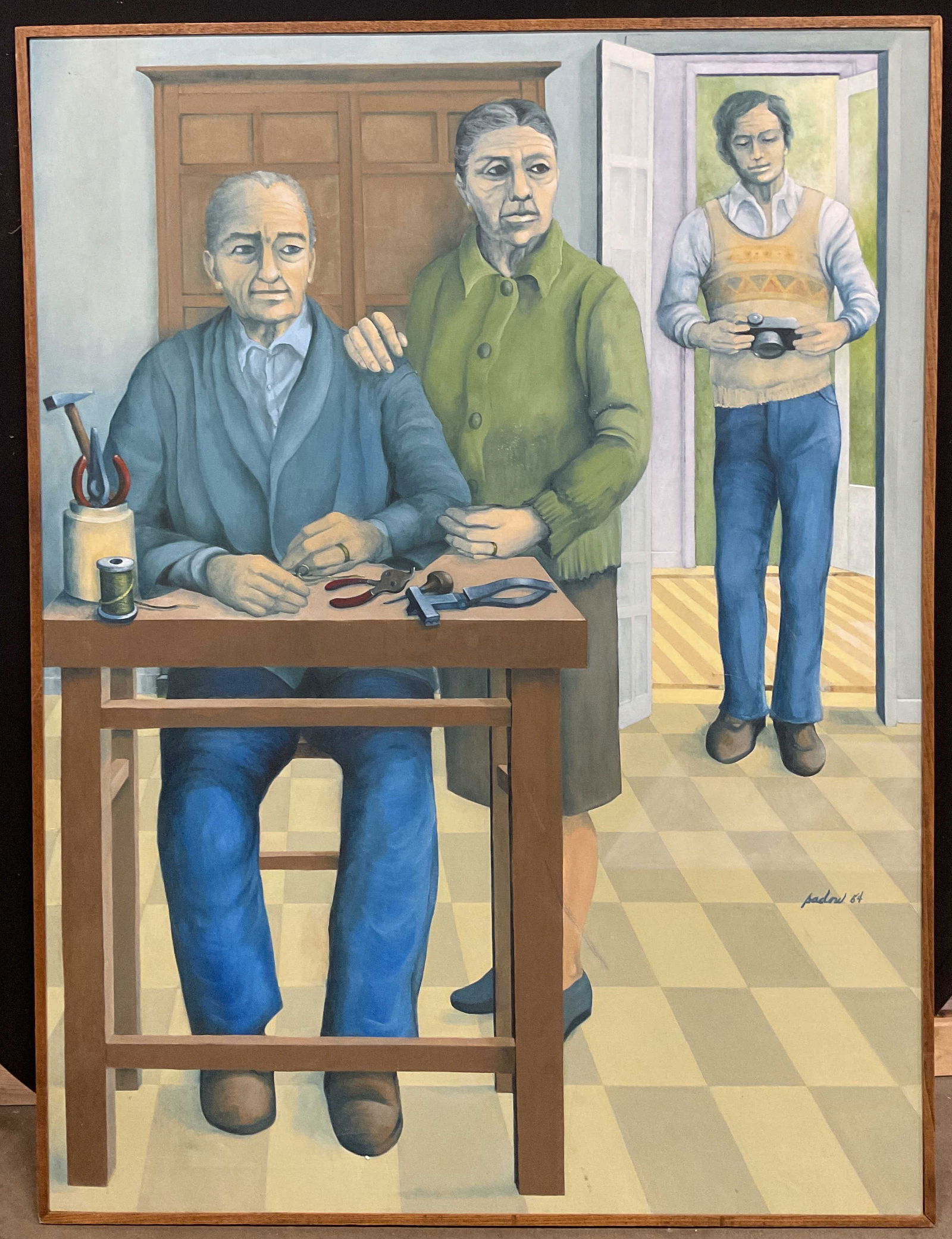 Signed Sadow Figure Scene Oil Painting 56in 1984: Framed oil on canvas painting. Signed lower right, Sadow. Dated 1984. Figure scene with couple, workbench, man and camera. Wood frame. Not examined out of frame. Measures approx 56.75 x 42.5 inches. S