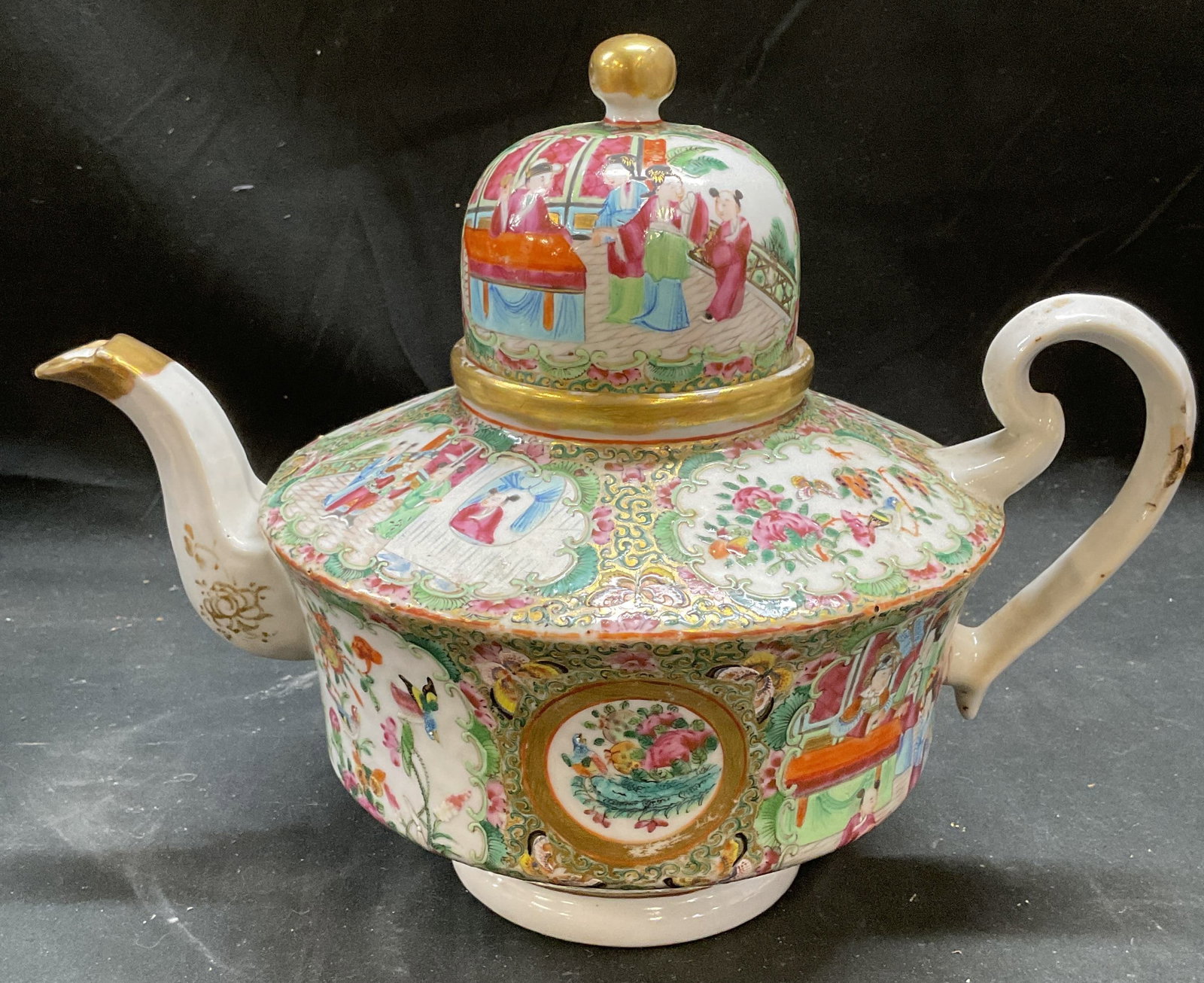 Antq Chinese Porcelain Rose Medallion Teapot: Antique Chinese porcelain teapot. Rose Medallion/Famille Rose pattern. Cartouches of traditional Chinese figure and floral designs in palette of pink and green. Hand painted with gilt decoration. Meas