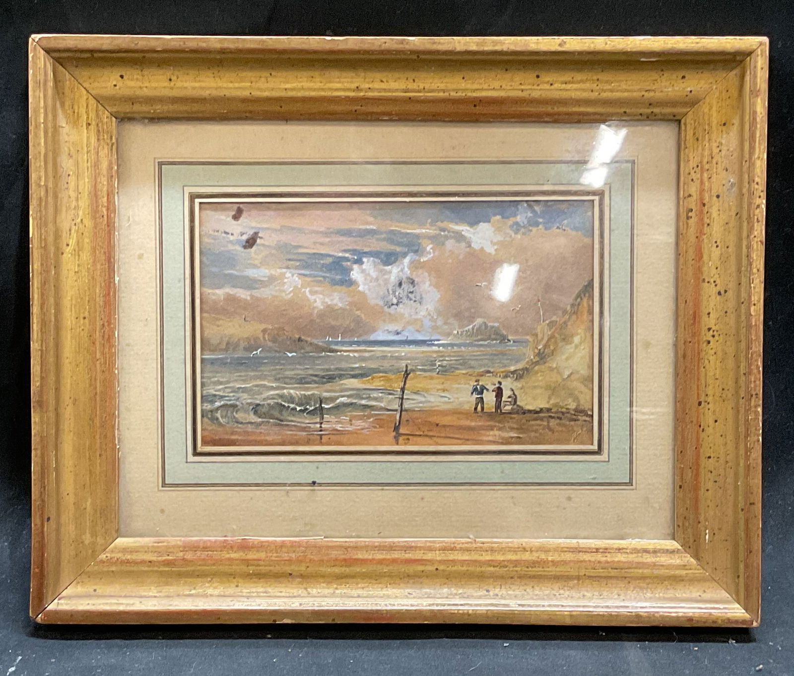 Framed Sea Landscape Watercolor Painting: Framed and matted watercolor or gouache painting on paper. Landscape with sea and figures at shore. Gilt wood frame. Not examined out of frame. Frame measures approx 7 x 9 inches. Art, fine art, frame