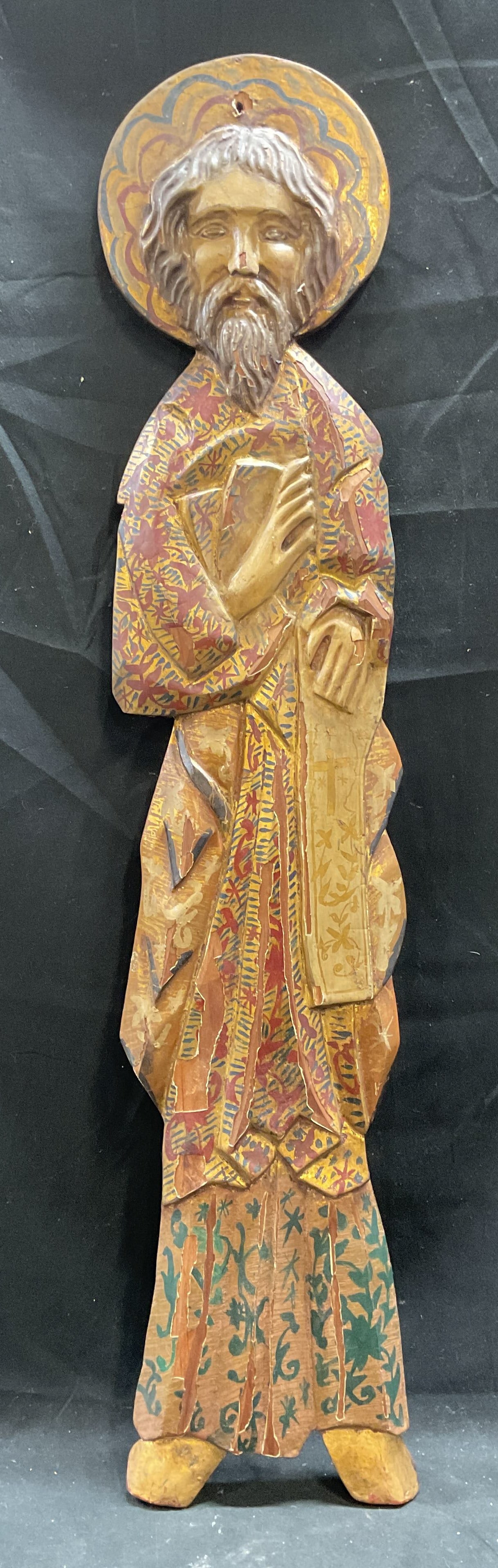 Carved Gilt Wood Saint Religious Folk Art 30 In T: Hand carved and painted gilt wood religious folk art plaque. Relief carving, male saint with halo and robe. Measures approx 6 x 30 inches. Some loss to paint and scratching. Religious folk art, folk a