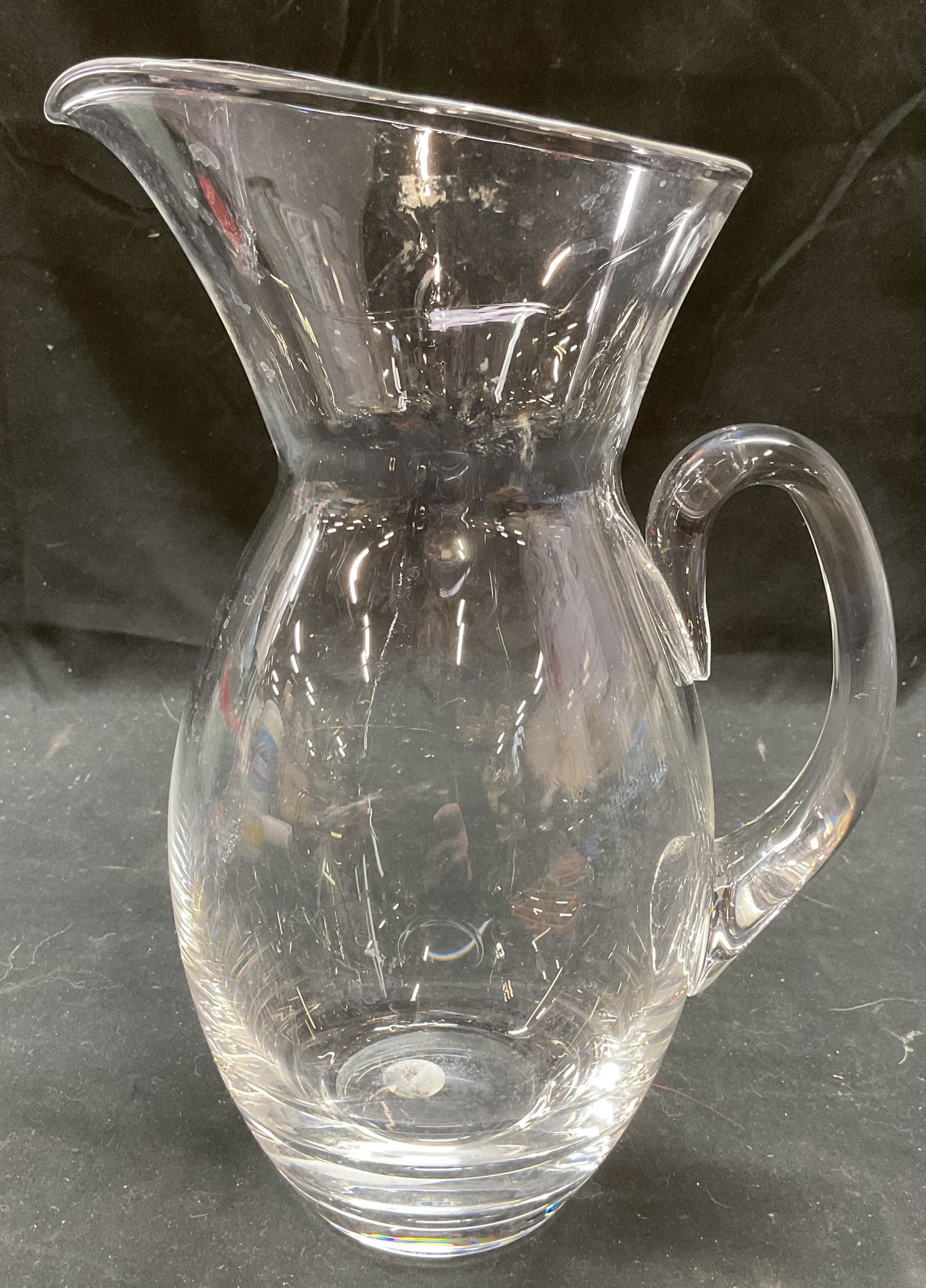 Vintage Steuben Art Glass Pitcher: Vintage Steuben Art glass pitcher. Hand blown glass with applied handles. Signed. Measures approx 7 x 4.5 x 10.75 inches. Some scratching. Steuben pitcher, art glass pitcher, collectibles, decorative