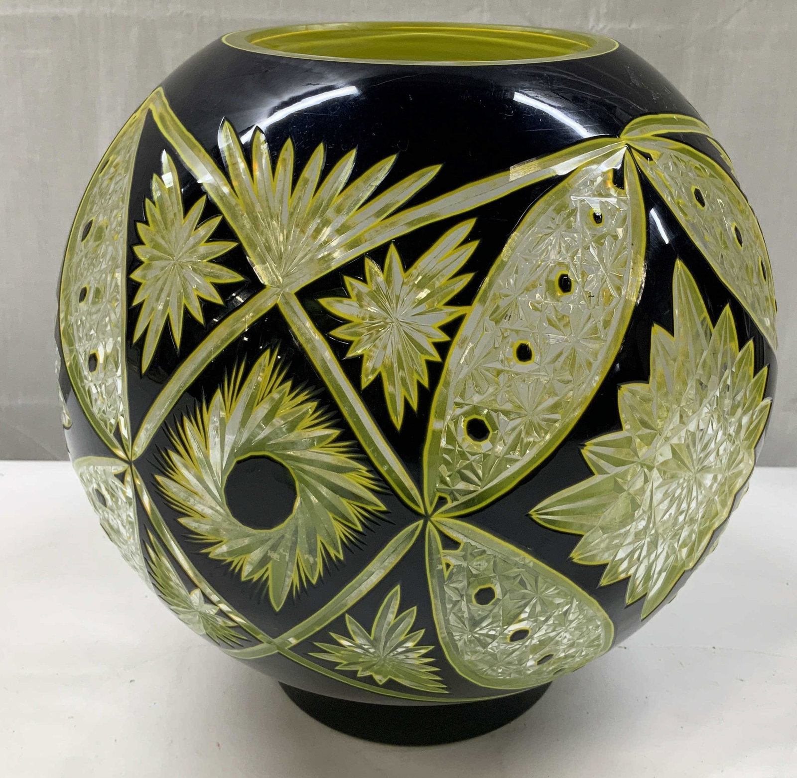 Vntg Bohemian Style Cut to Clear Glass Vase: Bohemian style cut to clear vase featuring a cobalt blue overlay cut through to a bright yellow crystal. Intricate geometric & starburst patterns. Surface wear consistent to age, use & exposure. Measu