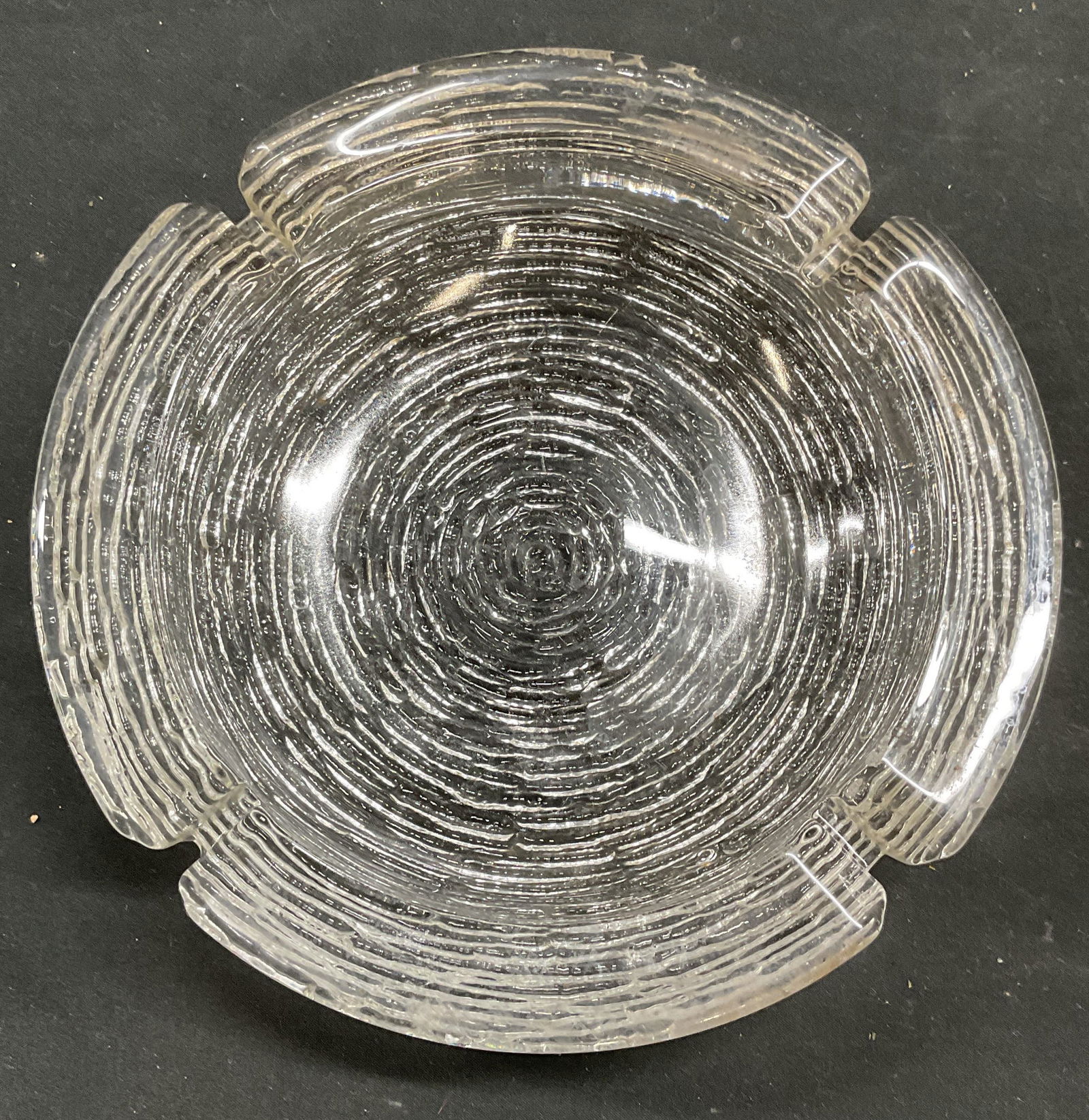 MCM Vintage Textured Art Glass Ashtray: Mid century modern vintage textured art glass ashtray. Measures approx 8.5 x 2 inches. Ashtray has weight. Some scratching. Art glass ashtray, mid century ashtray, mid century modern, glass ashtray, c