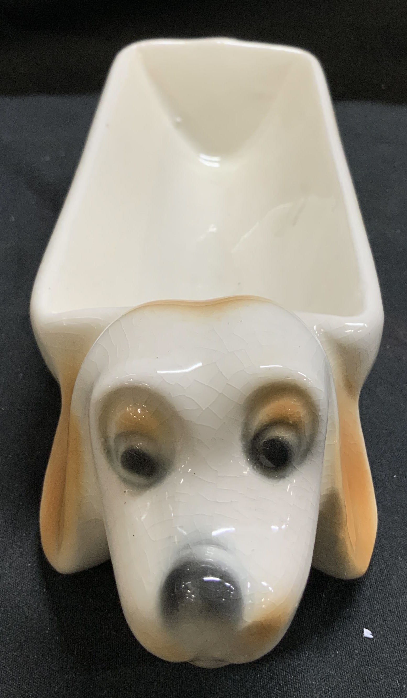 Vntg Dachshund Dog Ceramic Butter Dish: Appears to be possible butter dish. Dish is ceramic material & is shaped like a dachshund dog. Dog has brown & white tones. No visible signature or markings. Surface wear consistent to age, use & expo