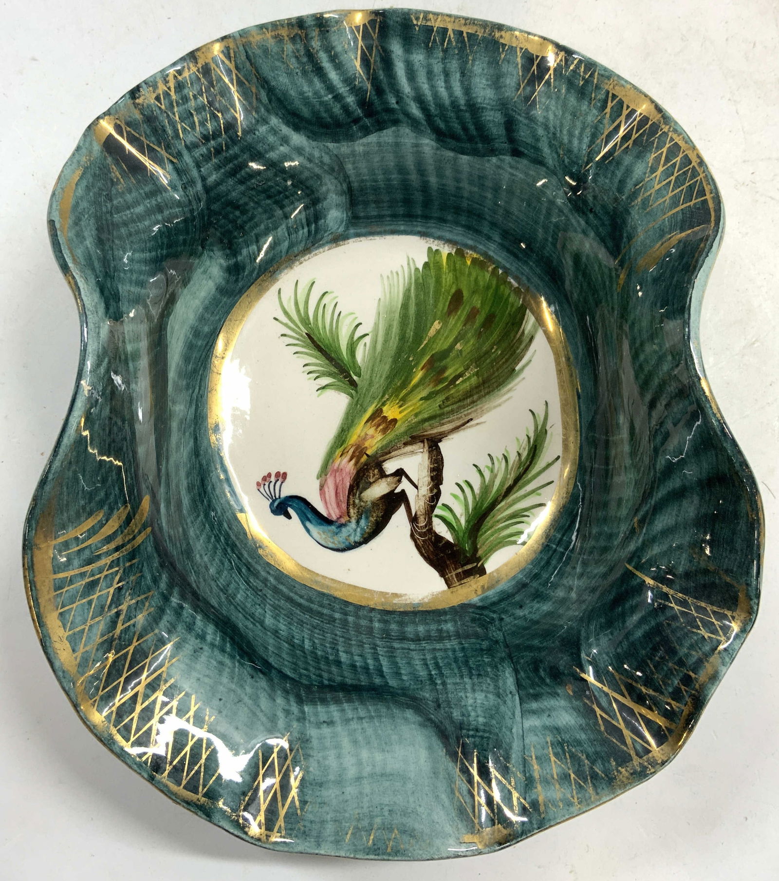 Hubert Bequet Vtg Ceramic Bwl W Peacock BELGIUM: Underside is inscribed BELGIUM 182. Bowl is ceramic. Piece is vintage circa mid 20th century. Bowl has hand painted peacock in center. Outer area is green with gilt detailing. Bowl has unique partiall