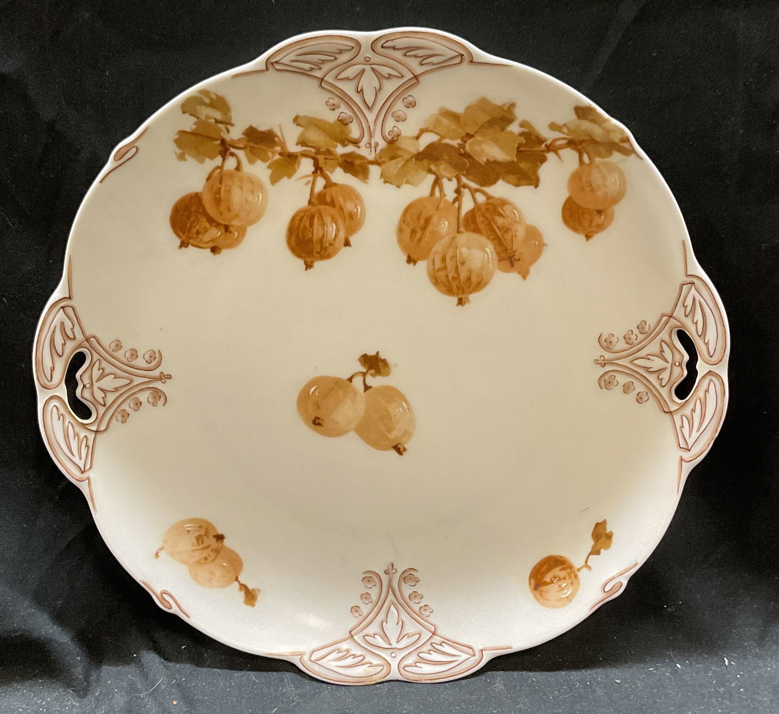 Antique Ohme Silesia Fruit Porcelain Platter: Antique Ohme Silesia porcelain platter. Hand painted fruit motif in brown and off white. Signed. Measures approx 10 inches wide. Some scratching and small hairline crack. Ohme, Ohme Silesia, Silesia p
