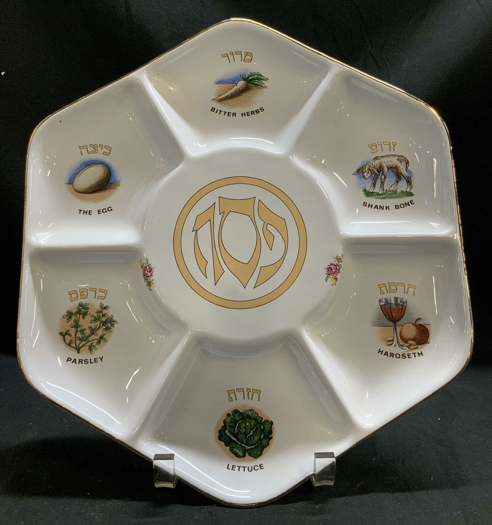 Eckstein Ceramic Judaica Passover Plate ISRAEL: Passover plate is ceramic material & reads, Bitter Herbs, The Egg, Parsley, Lettuce, Shank Bone & Haroseth. Plate features illustrations & gold accents. Signed & marked on underside. Reads, MADE IN IS