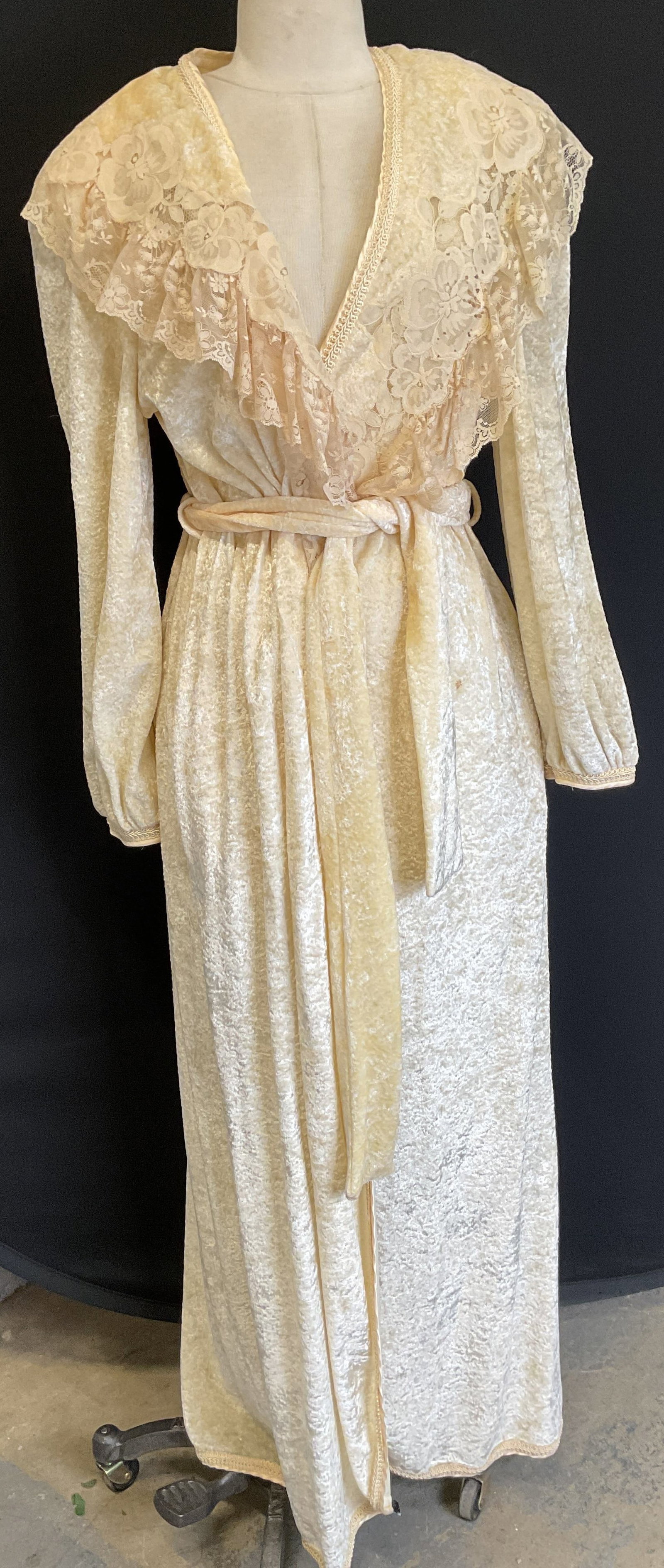 Vtg Christian Dior Cream Arnel Lingerie Robe USA: Vintage Christian Dior Cream arnel lace lingerie robe. Lace lapel collar design, two pockets. Belted waist, padded shoulders. Size L. 85% arnel, 15% nylon. Made in USA. Some staining, discoloration pr
