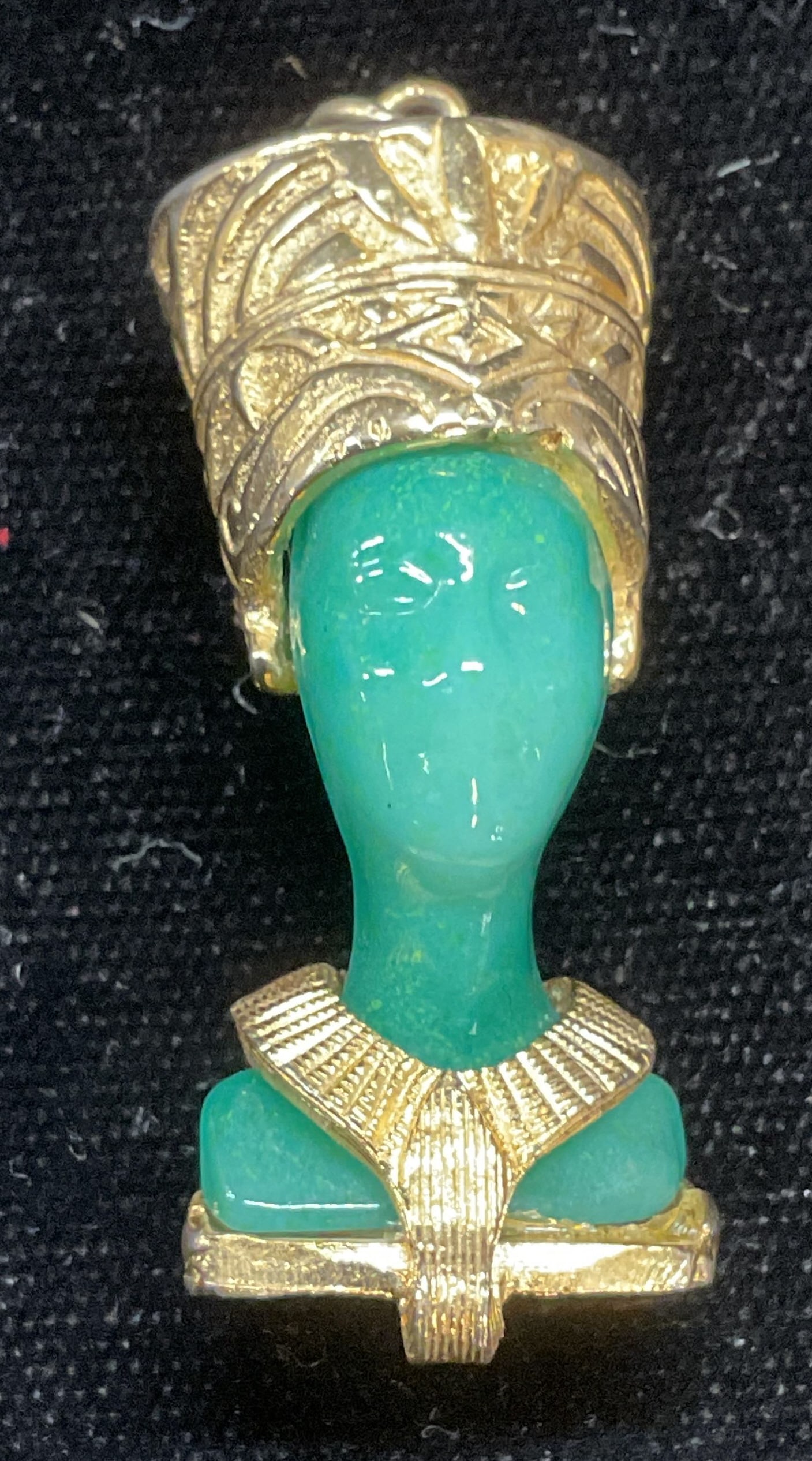 Gold Tone Faux Jade Nefertiti Head Pendant: Gold tone and faux jade glass Nefertiti head motif pendant. Measures approx 1.5 x .75 inches. Some scratching. Jewelry, estate jewelry, costume jewelry, cocktail jewelry, fashion jewelry, accessories,