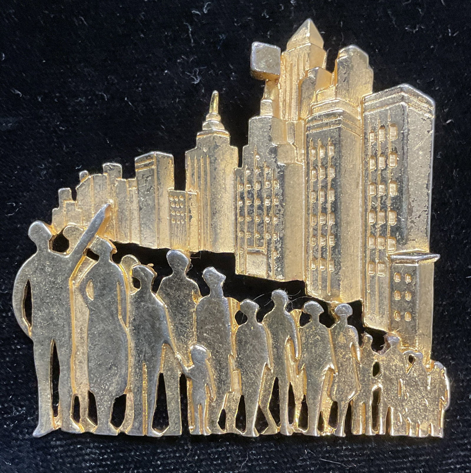 JJ JONETTE Gold Tone Figural City Brooch: Vintage JJ JONETTE gold tone figural and city motif brooch. Signed. Measures approx 2.25 x 2.25 inches. Some scratching. Jewelry, estate jewelry, costume jewelry, cocktail jewelry, fashion jewelry, ac