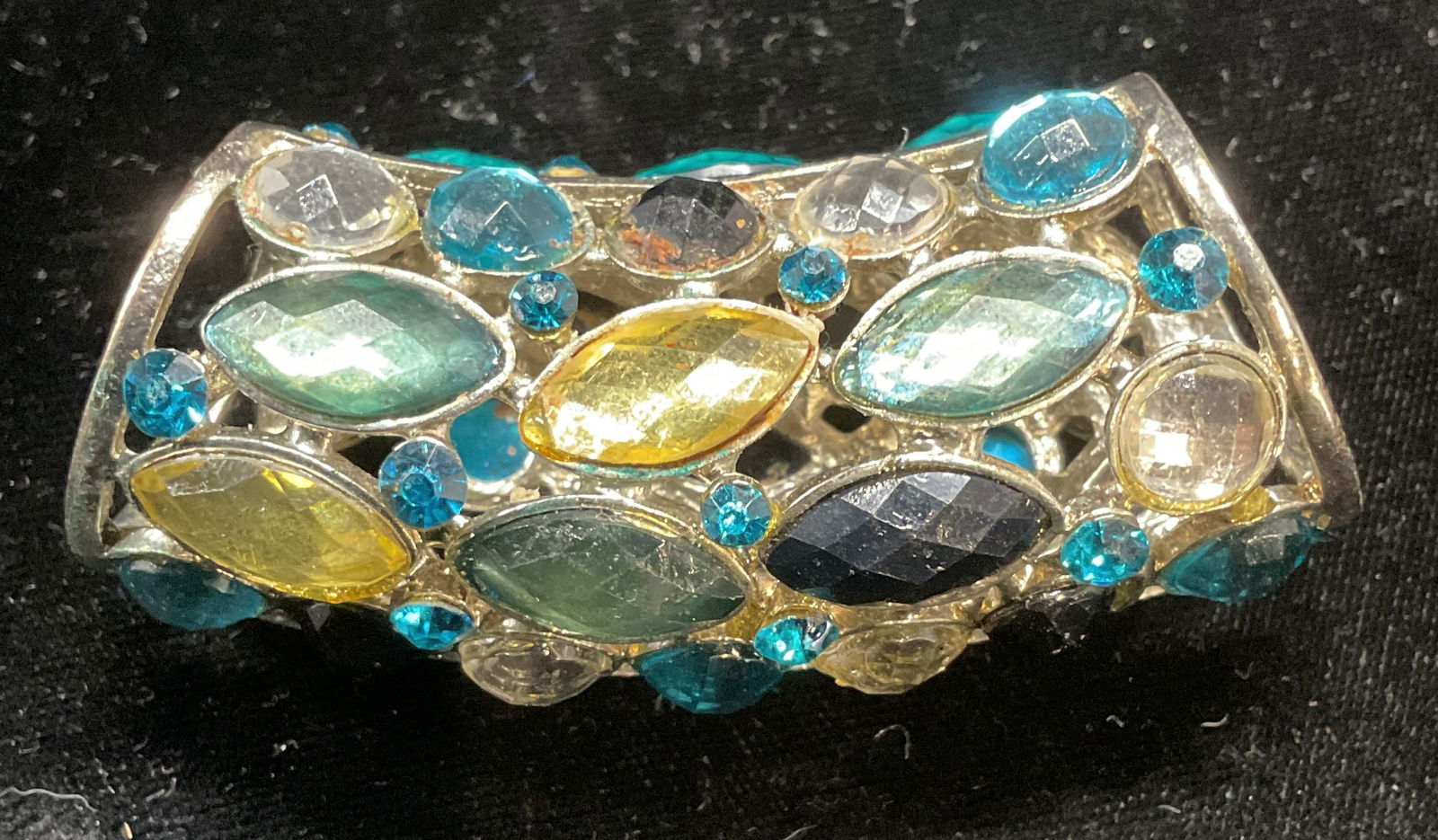 Silver Tone Lucite Crystal Enhancer Pendant: Silver tone enhancer pendant with colorless, blue, and yellow toned lucite crystals. Measures approx 1 x 3 inches. Some scratching. Jewelry, estate jewelry, costume jewelry, cocktail jewelry, fashion