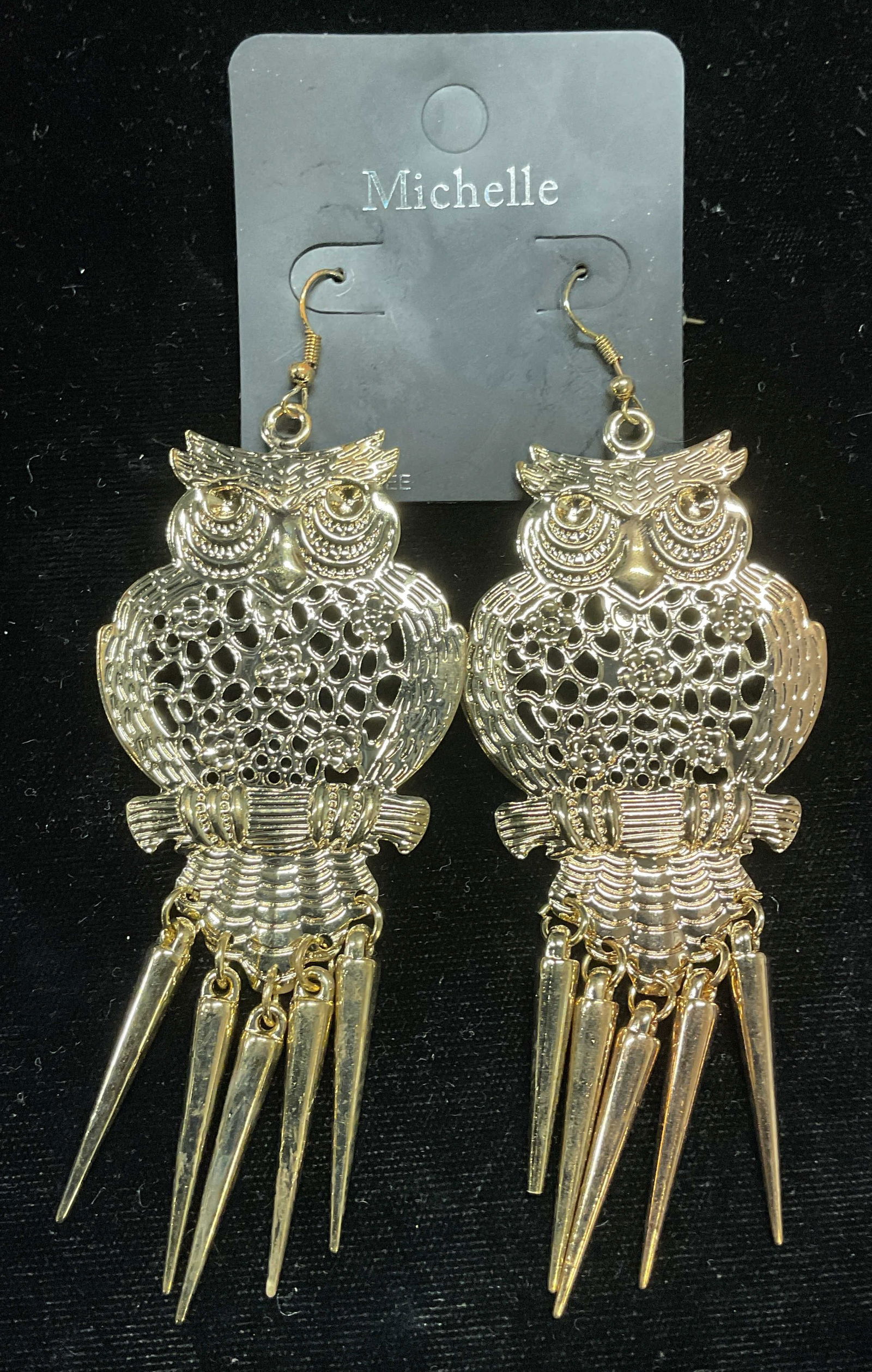 Michelle Gold Tone Owl Earrings NWT: Michelle gold tone owl motif dangle earrings. Measures approx 3.75 x 1.5 inches. New with tag. Some scratching. Jewelry, estate jewelry, costume jewelry, cocktail jewelry, fashion jewelry, accessories