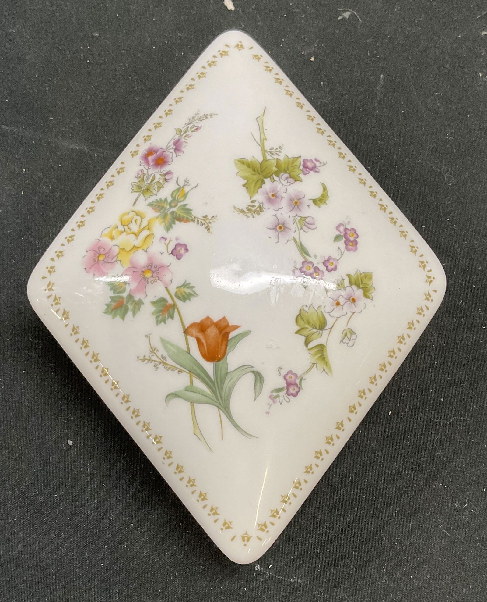 Wedgwood Mirabelle Bone China Trinket Box England: Wedgwood bone china lidded diamond shaped trinket box. Mirabelle pattern. Floral design. Signed. Made in England. Measures approx 5 x 4 x 1.5 inches. Some scratching. Wedgwood box, Wedgwood trinket bo
