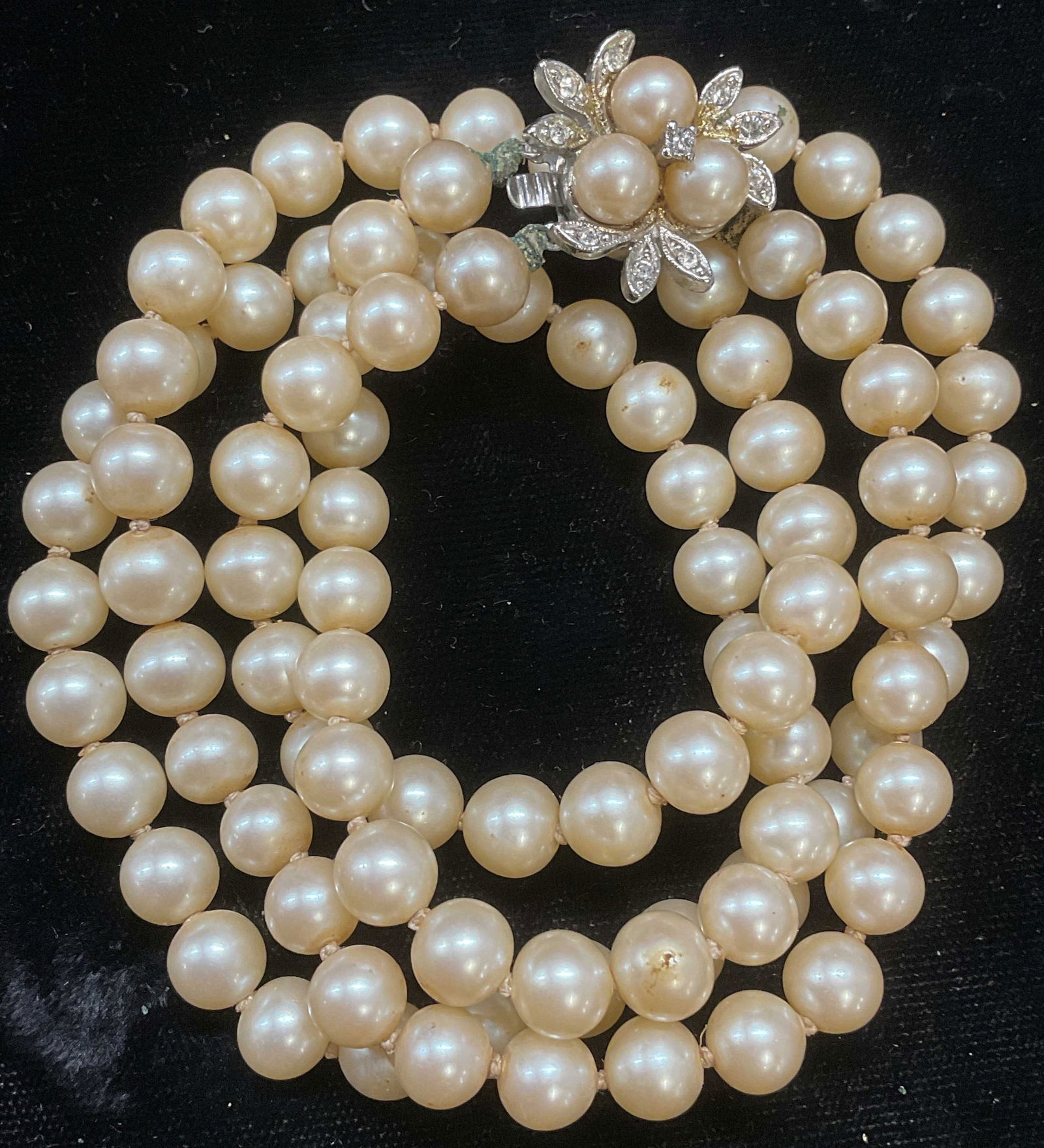 Vintage Faux Pearl Crystal Choker Necklace: Vintage double strand faux pearl choker necklace with crystal flower motif clasp. Drop length approx 6.5 inches. Some wear including scratching observed. Jewelry, estate jewelry, costume jewelry, cock