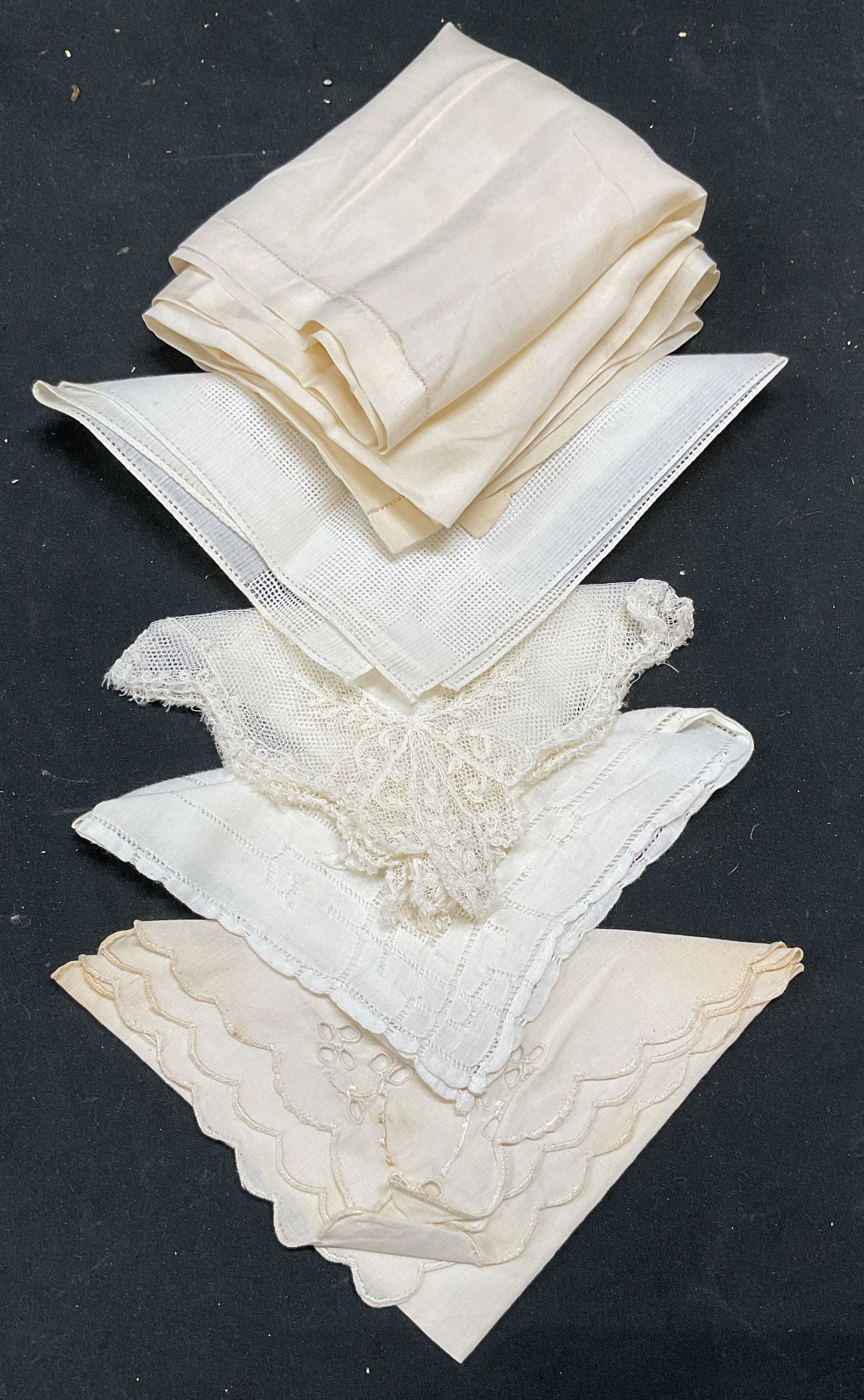 Lot 5 Vintage White Lace Handkerchiefs: Lot of 5 vintage white handkerchief with lace and solid designs. Feel like cotton, one possibly silk. Sizes vary. Largest approx 17 x 18 inches. All pieces have wear including blemishes and tears. Han