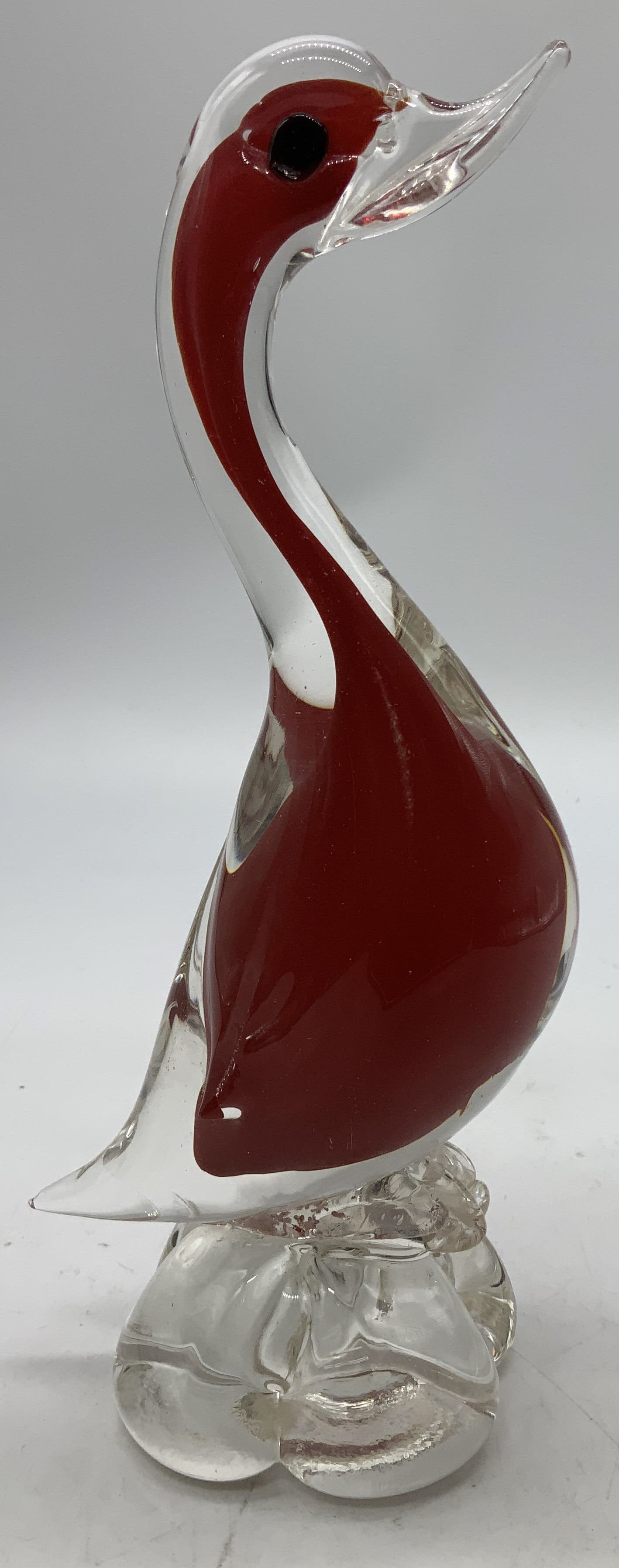 Vntg Hand Blown Red Glass Duck Figurine: Duck figurine is hand-blown & features a dark red interior. Pointed beak, curved neck & black eyes. Duck stands on clear glass base. Appears to be possible MURANO. No visible signature or markings. Su