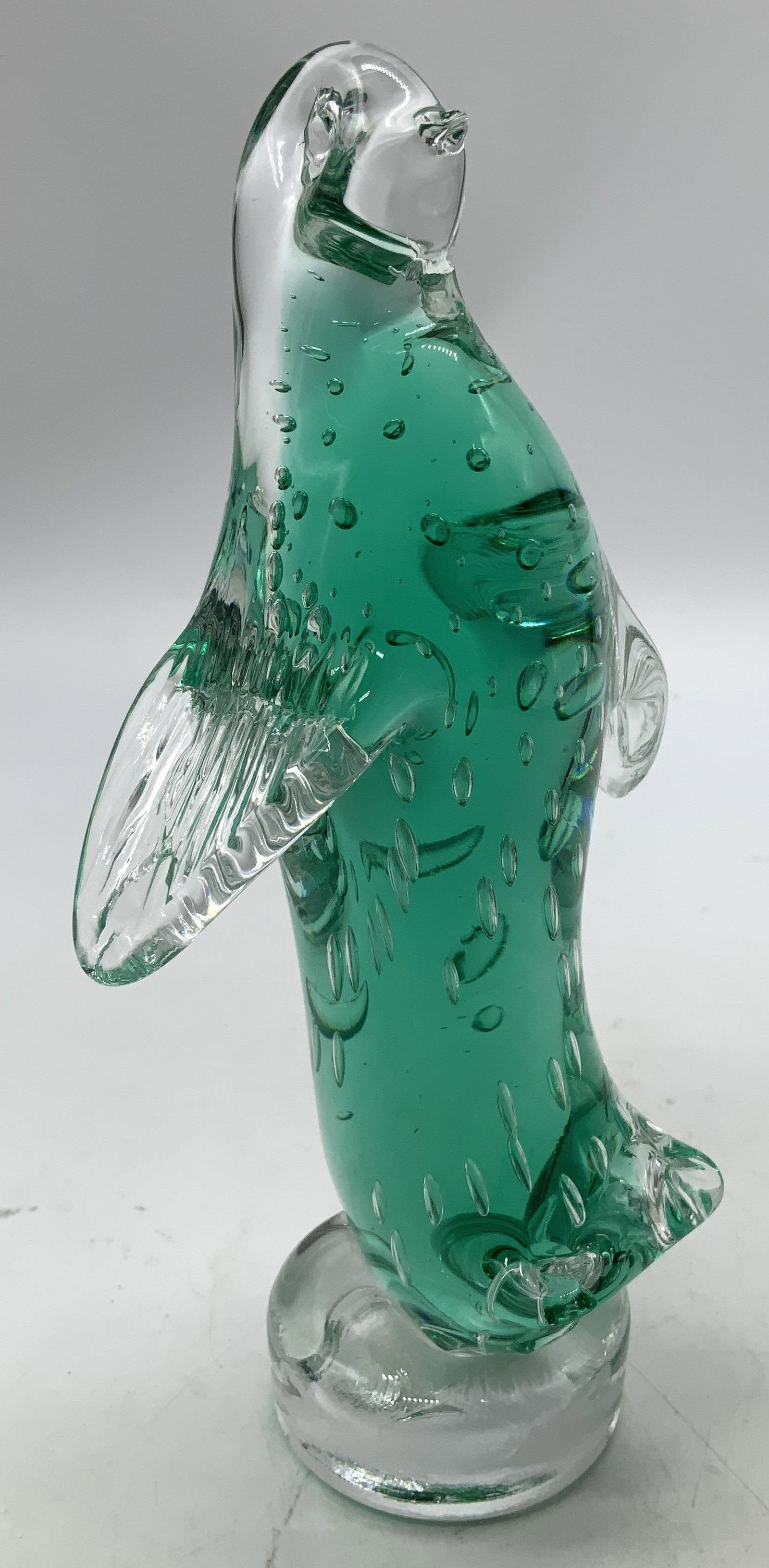 Vntg MURANO Green Penguin Figurine ITALY: Hand-blown Art glass figurine that features a green penguin standing upright on a clear base. Body features controlled bubbles technique. Surface wear consistent to age, use & exposure. Measurements: 