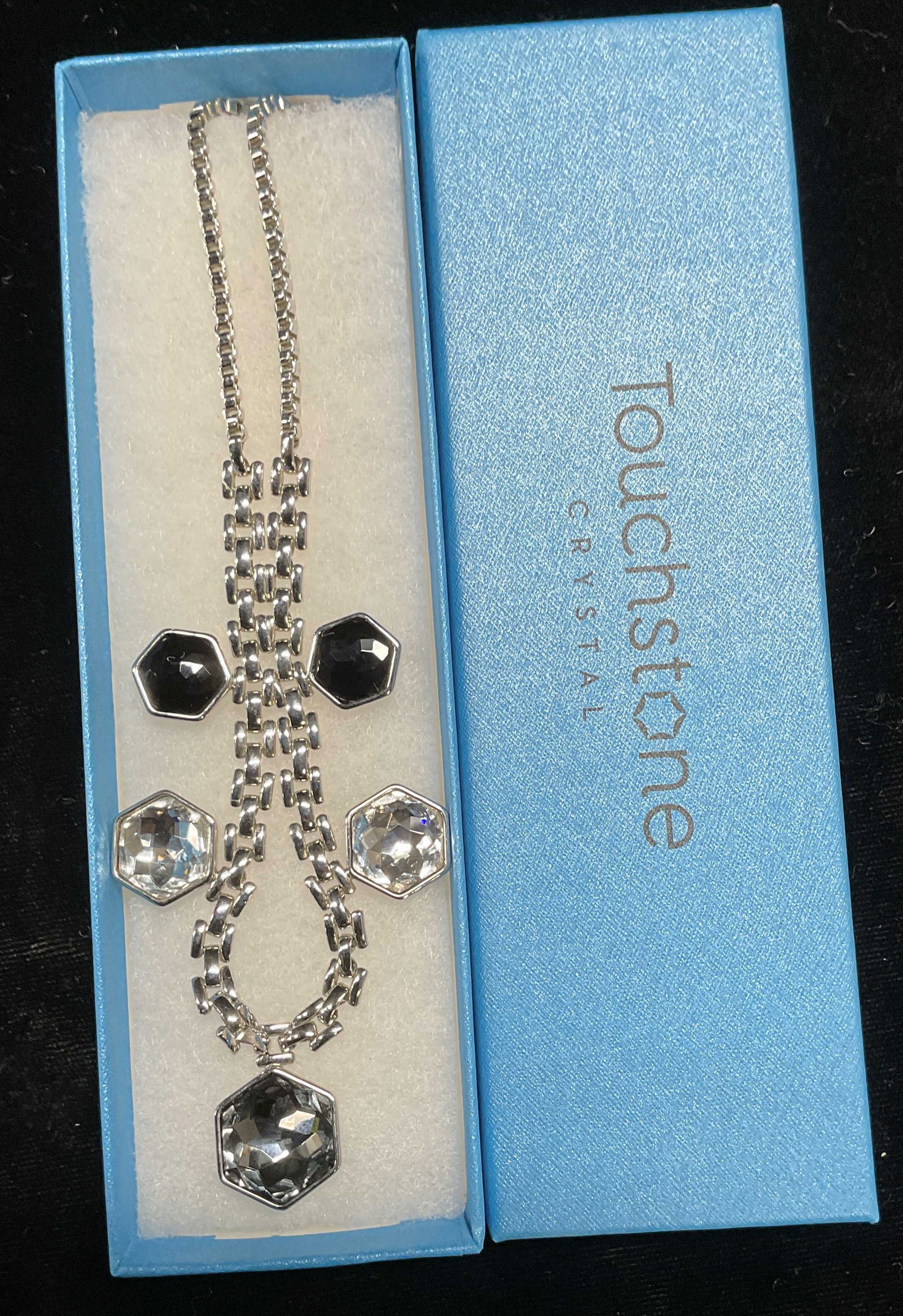 Swarovski Touchstone Crystal Pendant Necklace NIB: Touchstone by Swarovski silver tone pendant necklace with colorless and black crystals. Signed. New in box. Drop length approx 8.5 inches. Some scratching. Jewelry, estate jewelry, costume jewelry, co