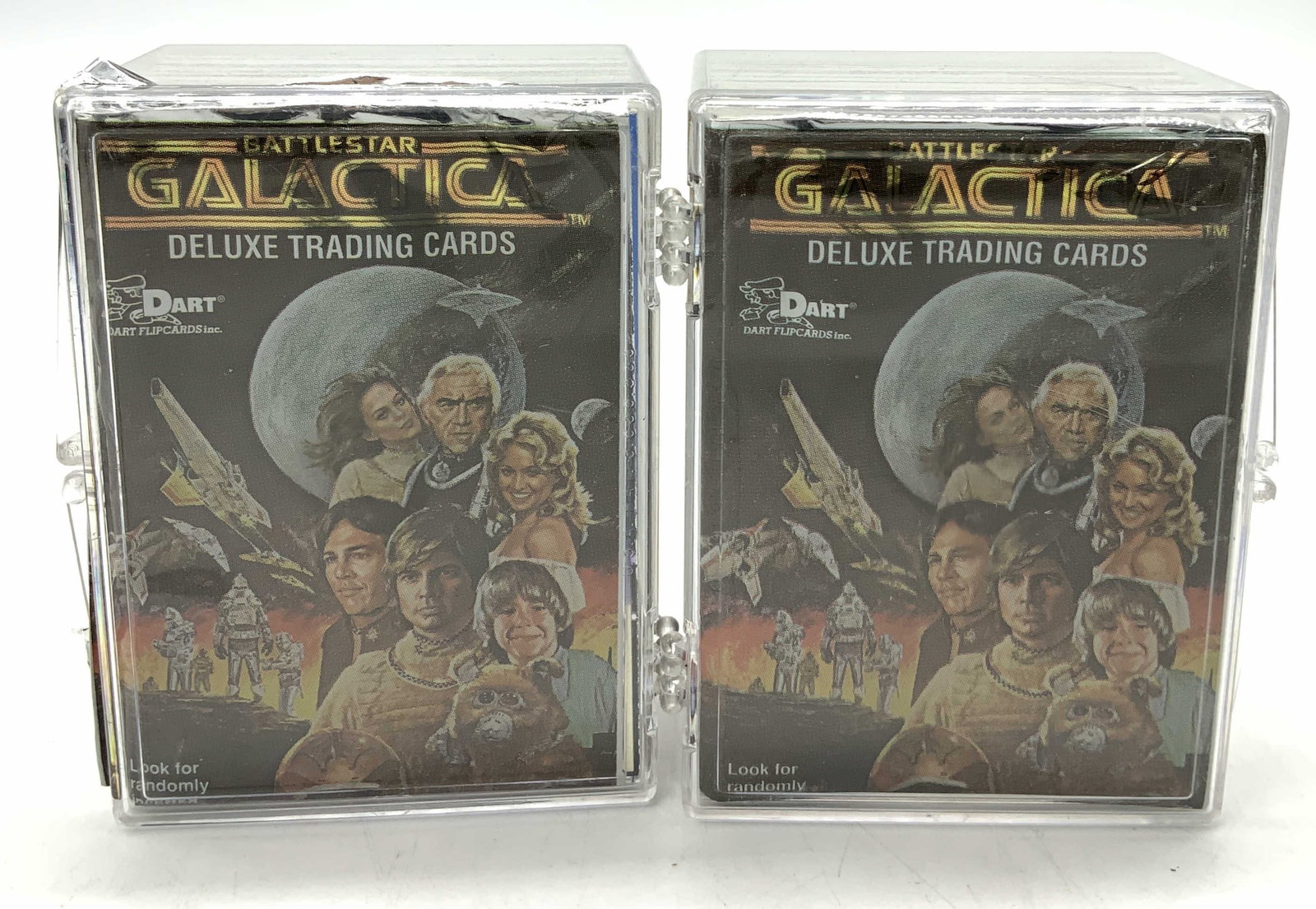 50+ 1996 Battlestar Galactica Deluxe Trading Cards: Lot 50+ 1996 Battlestar Galactica Trading Cards Lot includes 50+ collectible trading cards from 1996 Battlestar Galactica. Printed in the U.S.A. Cards features various illustrations of characters & ha
