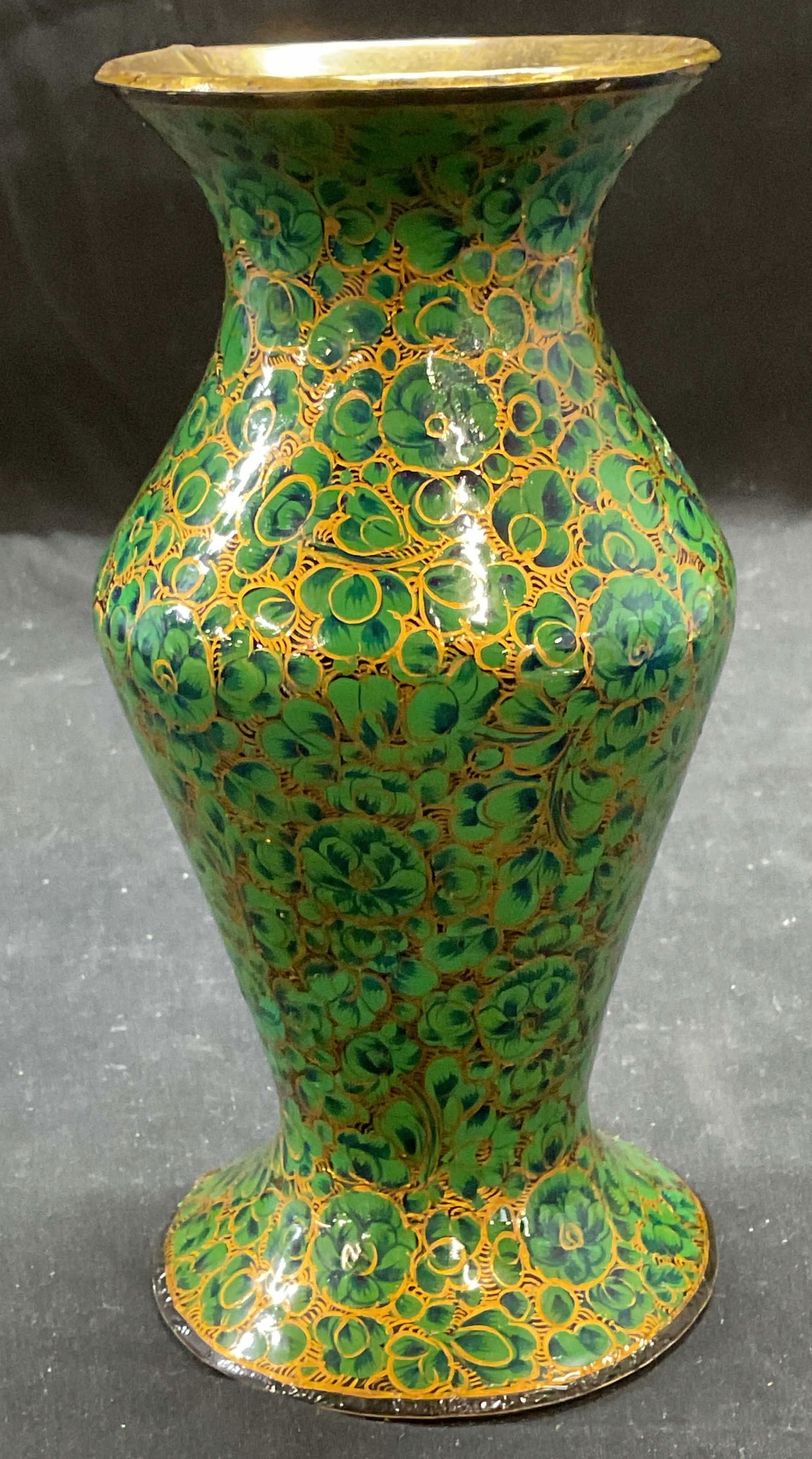 Lacquered Wood & Brass Green Gilt Vase: Lacquered wood vase with brass covered rim and base. Hand painted green with gilt decoration. Floral motif. Measures approx 3.25 x 7 inches. Some scratching. Vase, lacquered vase, wood vase, brass vas