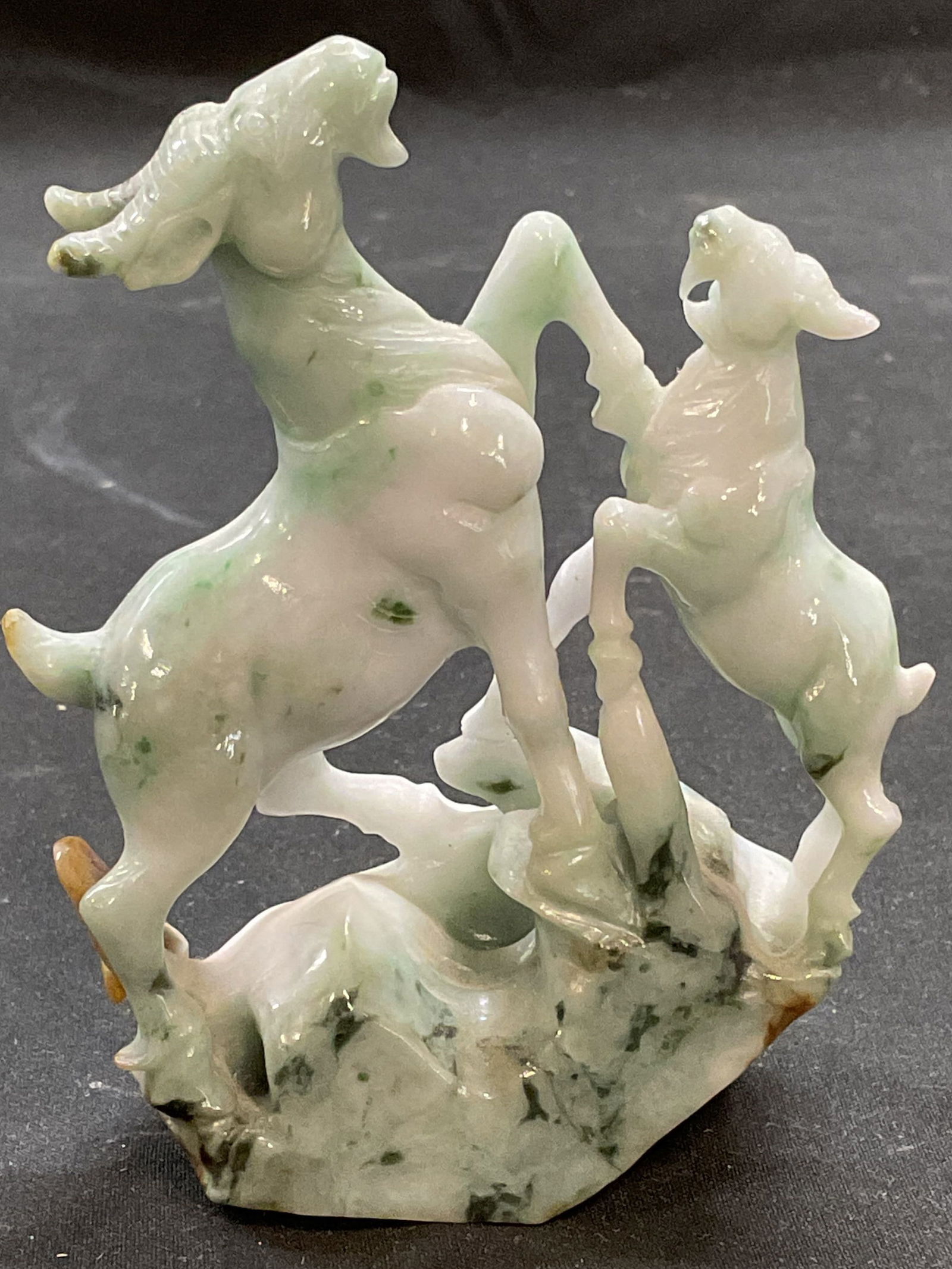 Asian Carved Jade Ram Sheep Figurine: Asian carved jade figurine depicting Ram/sheep. Measures approx 3 x 1.5 x 4.25 inches. Some surface wear consistent with exposure. Ram figurine, sheep figurine, jade ram, jade sheep, Asian figurine, c