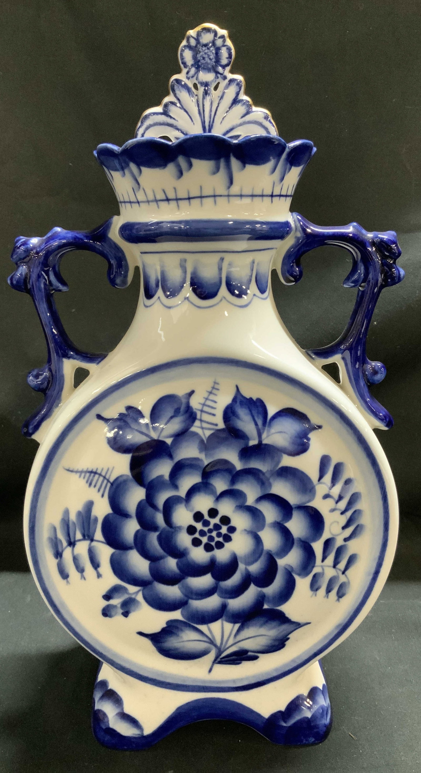Vntg GZHEL Blue & White Lidded Decanter RUSSIA: Appears to be possible decanter. Features hand-painted floral details. Blue & white tones. Lid of decanter has gold accents. Signed & marked on underside. Reads, HAND MADE GZHEL. IN RUSSIA. Surface we