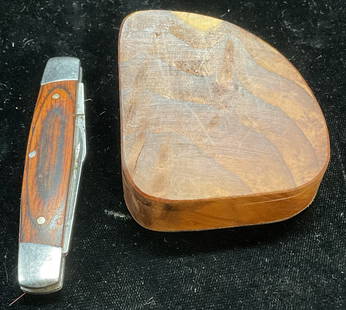 Lot 2 Wood Jewelry Box & Pocket Knife: Lot of 2 pieces. Wood jewelry box with leather covered base. Measures approx 2 x 2.25 x 1.25 inches. Silver tone metal and wood pocket knife. Measures approx 3 inches long. Some scratching and residue