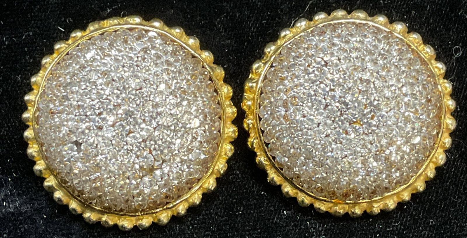 Vtg Deanna Hamro Gold Tn Crystal Earrings: Vintage signed Deanna Hamro gold tone colorless crystal domed earrings. Measure approx 1.5 inches wide. Some scratching. Some crystal need replacement. Jewelry, estate jewelry, costume jewelry, fashio