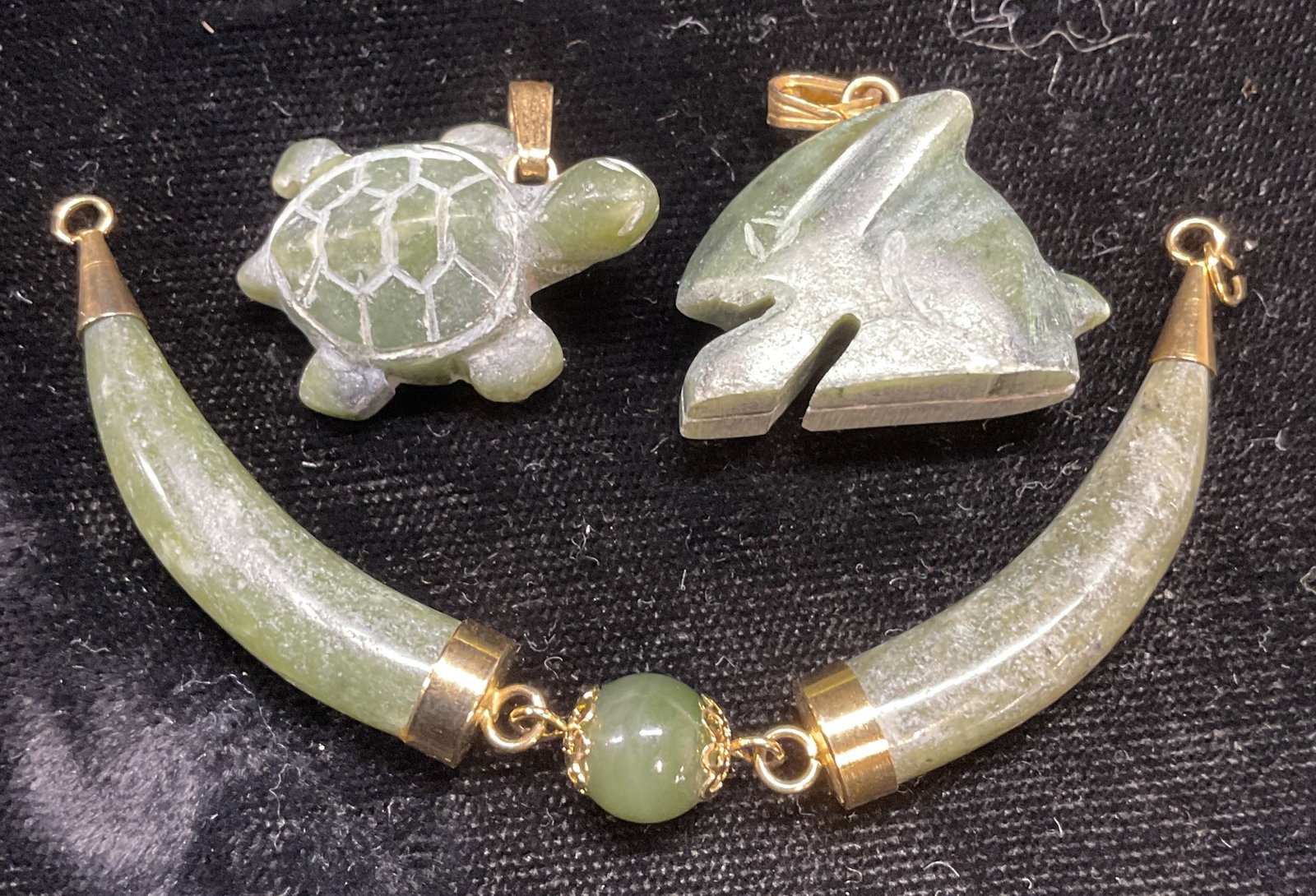 Lot 3 Nephrite Jade Pendants, Turtle & Rabbit: Lot of 3 nephrite jade pendants. Turtle, rabbit, and ball & curved shapes. Largest approx 3.75 inches long. Some scratching. Jewelry, estate jewelry, costume jewelry, fashion jewelry, cocktail jewelry