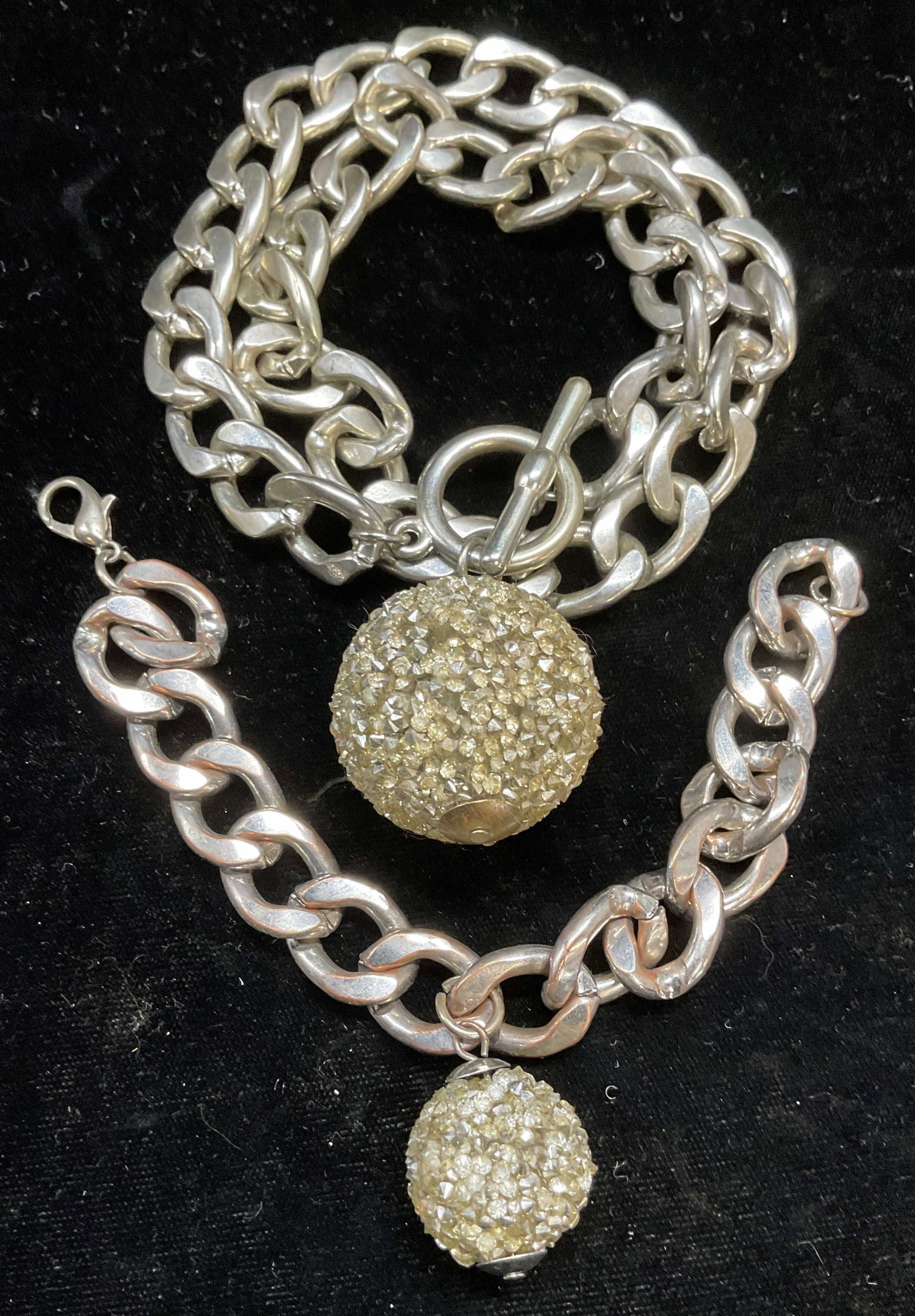 Lot 2 Chain Crystal Pendant Necklace & Bracelet: Lot of 2 jewelry pieces. Matching silver tone heavy chain necklace and bracelet with round crystal pendants. Necklace drop length approx 8.5 inches. Bracelet approx 6.75 inches long. Some scratching. 