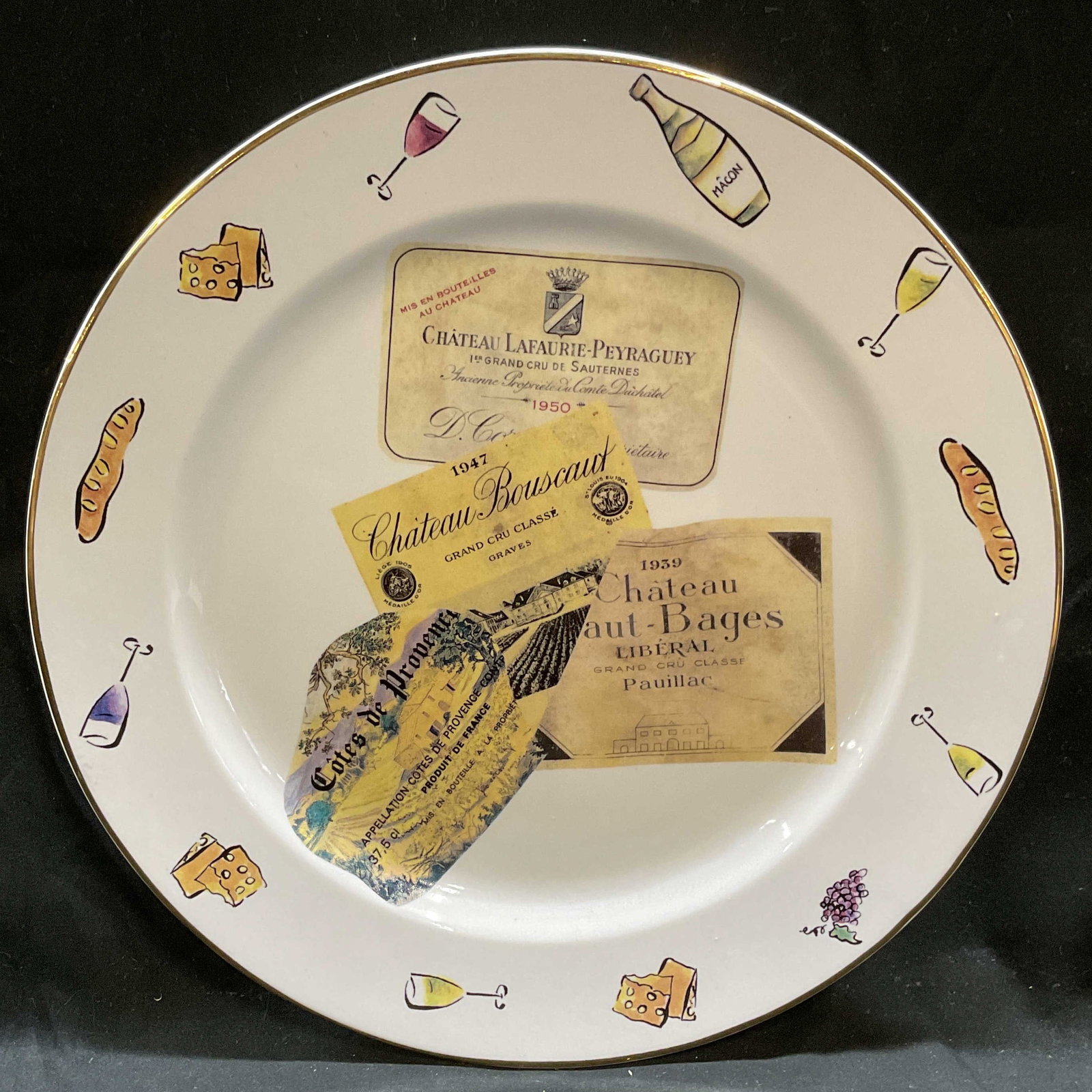 Rosanna Porcelain Wine Cheese Plate, Italy: Rosanna porcelain plate its wine and cheese motif. Signed. Made in Italy. Measures approx 11.5 inches wide. Some scratching. Rosanna plate, porcelain plate, cheese plate, wine plate, tableware, table