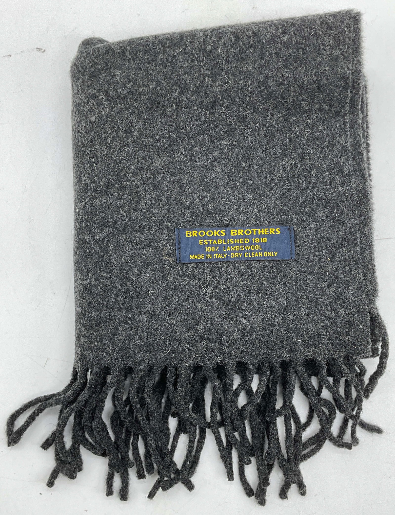 Brooks Brothers Grey Lambswool Scarf, Italy: Brooks Brothers grey lambswool fringe scarf. Made in Italy. Measures approx 62 inches long. Some wear consistent with exposure. Scarf, designer scarf, grey scarf, wool scarf, fringe scarf, brooks brot