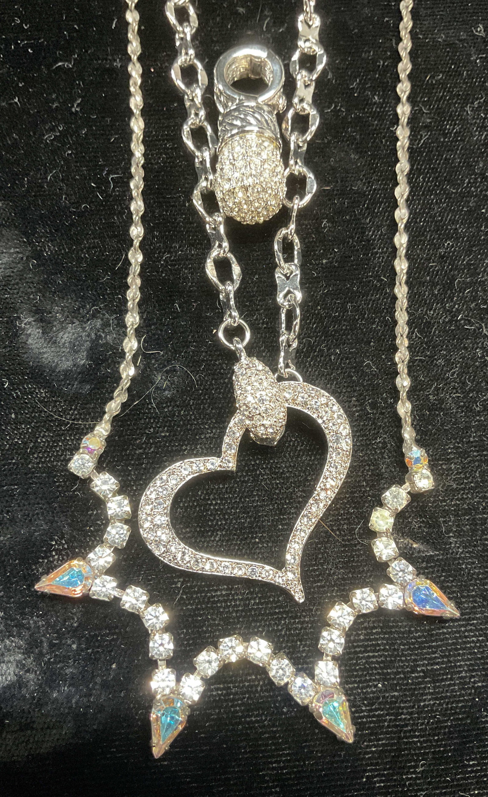 Lot 3 Silver Tone Crystal Necklaces & Pendant: Lot of 3 jewelry pieces. Silver tone crystal necklace and silver tone crystal heart pendant necklace. Longer drop length approx 8.5 inches. Silver tone crystal pendant. Measures approx 1 inch long. So