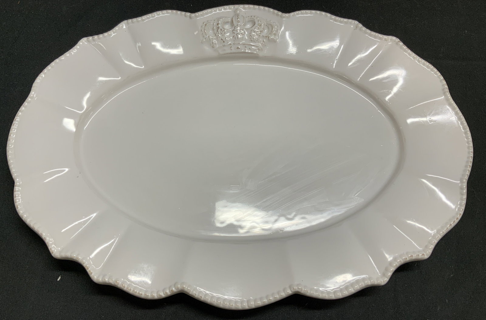 Vntg Blue Sky Crown Scalloped Serving Platter: Serving platter is ceramic material. Features a scalloped rim & a beaded design. Textured crown design. Signed & marked on underside, reads, B. Appears to be Blue Sky Crown. Surface wear consistent to