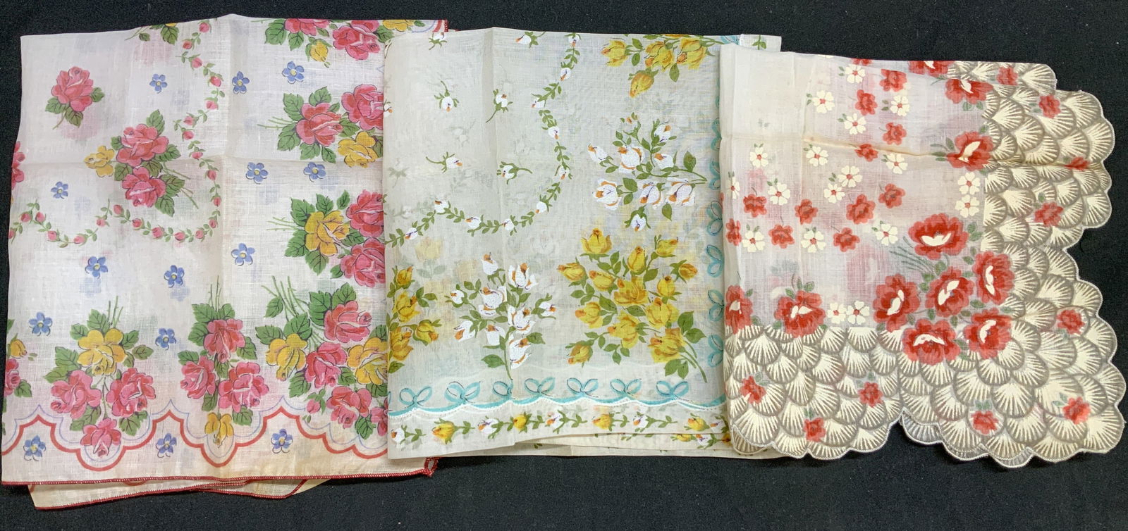 Lot 3 Vntg Floral Linen Handkerchiefs PHILIPPINES: Handkerchiefs appears to be possible linen or cotton material. They feature floral patterns in shades of red, pink, yellow, white, orange & more. 2 handkerchiefs have scalloped edges. Surface wear con