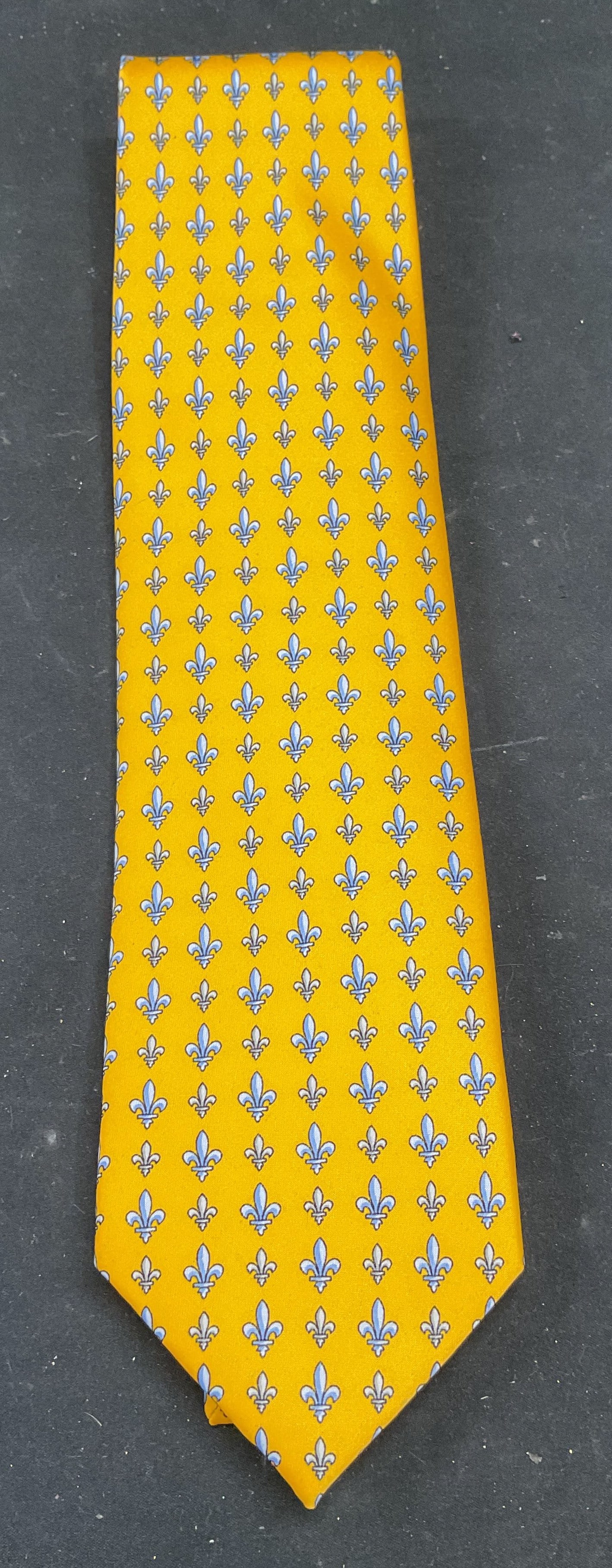 Yellow & Blue Fleur De Lis Silk Tie, Italy NWOT: Italian silk tie. Yellow and blue with fleur de lis print. Hand stitched. Measures approx 57 inches long. New without tag. Silk tie, Italian tie, yellow tie, fleur de lis tie, menswear, mens workwear,