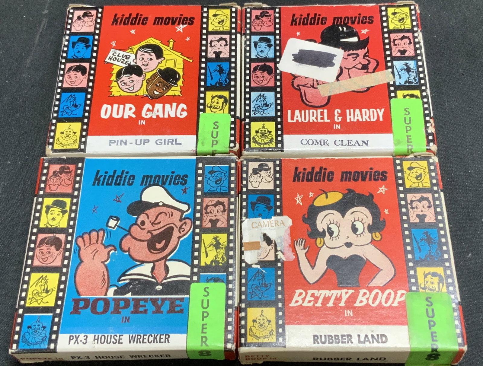 Lot 4 Vntg Atlas Films Super 8mm BETTY BOOP: Lot includes, 4 vintage Super 8mm film boxes from classic cartoon & comedy series. Titles include Popeye in PX-3 House Wrecker, Betty Boop in Rubber Land, Laurel & Hardy in Come Clean, and Our Gang In