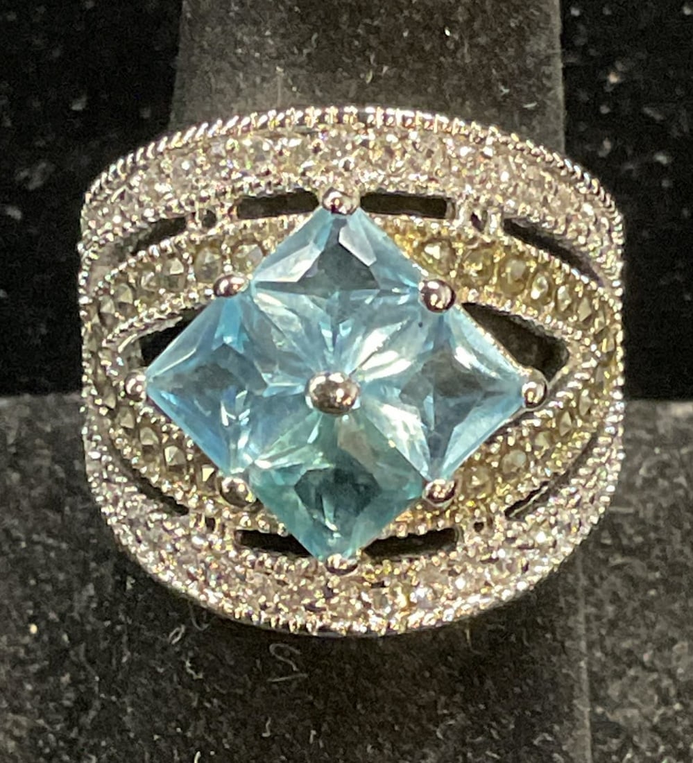 Silver Plated Blue Crystal Cocktail Ring: Silver plated cocktail ring. Blue and colorless crystal. Size 8. Some scratching. Jewelry, estate jewelry, costume jewelry, cocktail jewelry, fashion jewelry, accessories, fashion accessories, wearabl