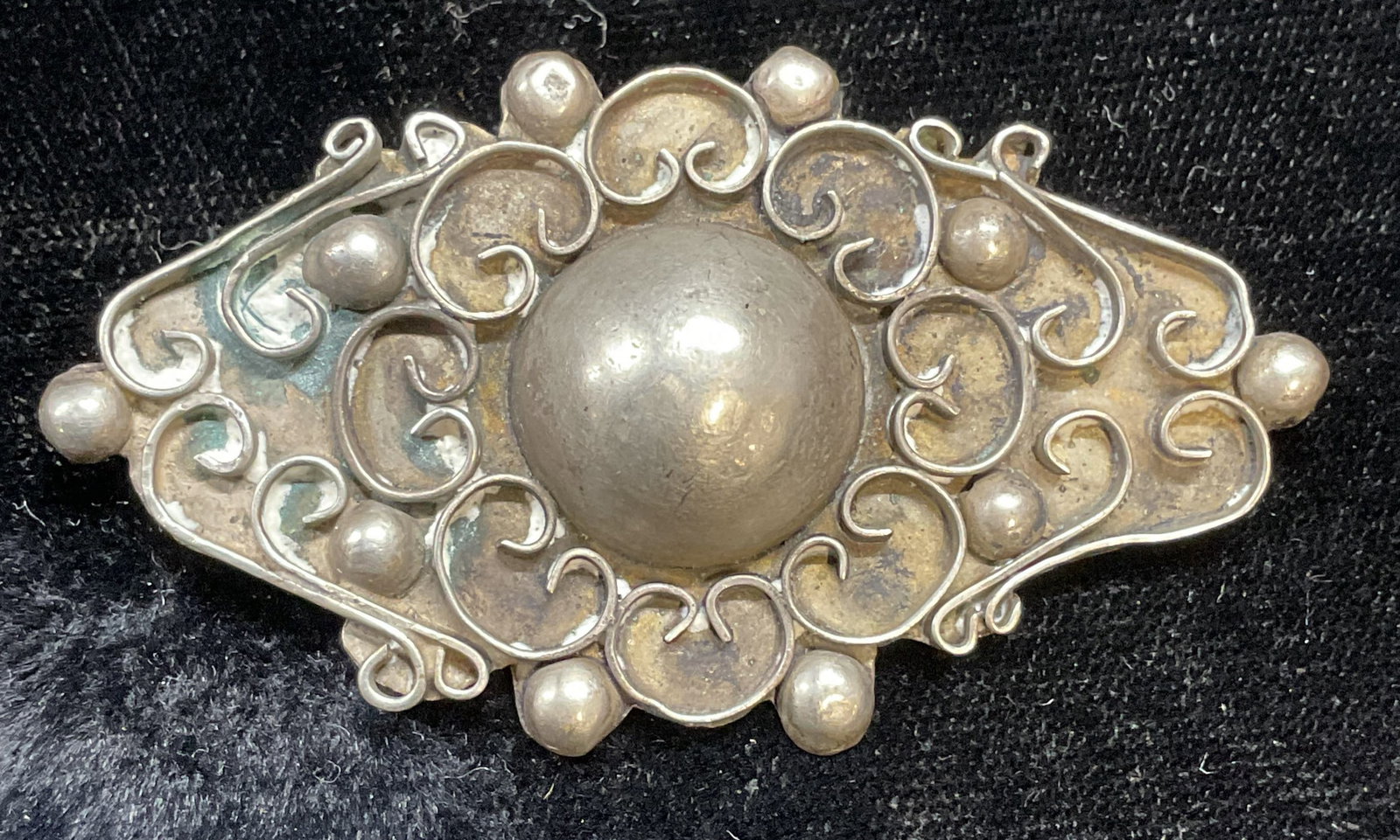 Vtg Silver Tone Filigree Brooch, Taxco Mexico: Vintage Mexican silver tone brooch with filigree and dome design. Marked Taxco. Measures approx 2.25 x 1.25 inches. Pin catch needs replacement. Some scratching. Jewelry, estate jewelry, costume jewel