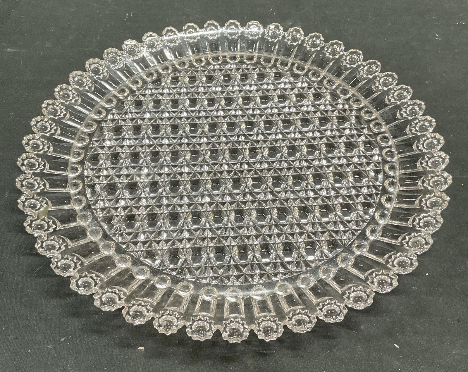 Vintage Round Scalloped Geometric Glass Platter: Vintage round glass platter with geometric pattern and scalloped rim. Measures approx 11 inches wide. Some scratching. Glass platter, round platter, tableware, table accessories, homewares, home acces