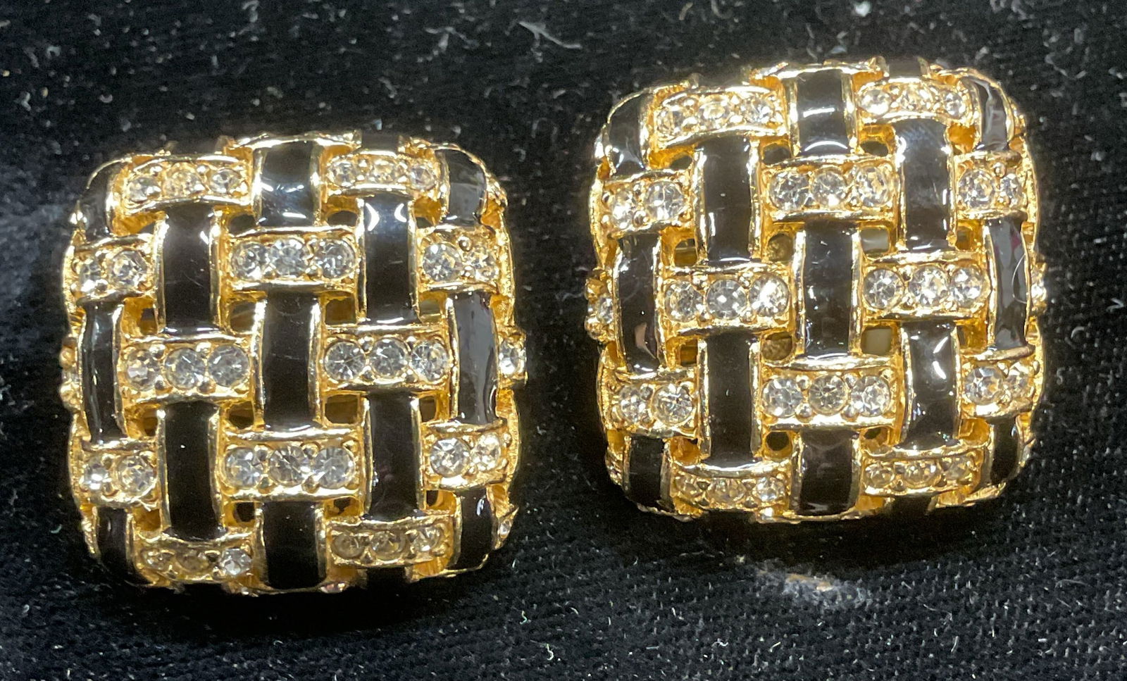 Vtg Ciner Gold Tn Crystal Enamel Woven Earrings: Vintage Ciner gold tone woven design square earrings with colorless crystal and black enamel. Signed. Measures approx 1 x 1 inches. Some scratching. Jewelry, estate jewelry, costume jewelry, cocktail
