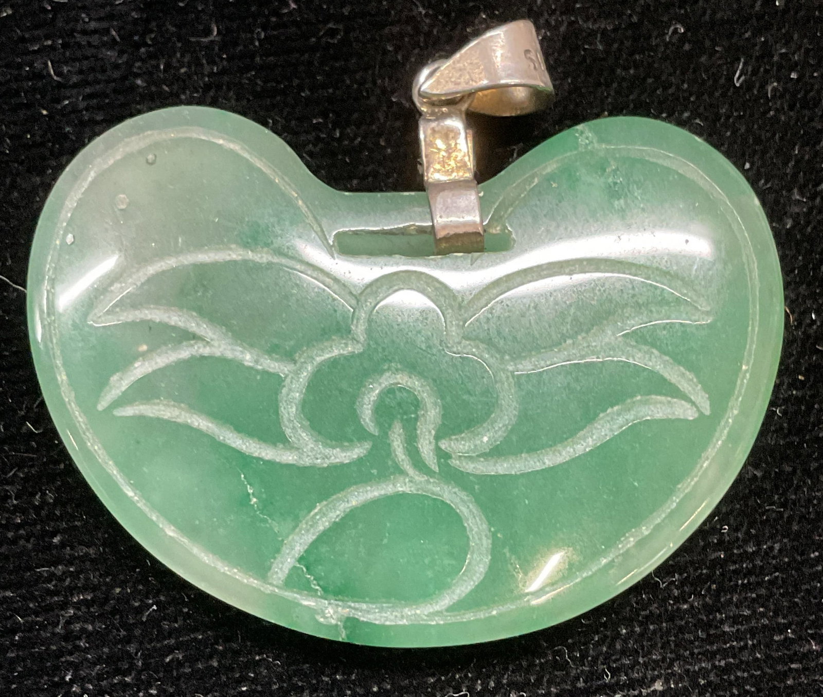 Vintage Chinese Carved Jade Pendant: Vintage Chinese carved jade pendant with design and characters. Measures approx 1 x 1.5 inches. Bail marked silver. Some scratching. Jewelry, estate jewelry, fine jewelry, cocktail jewelry, fashion je
