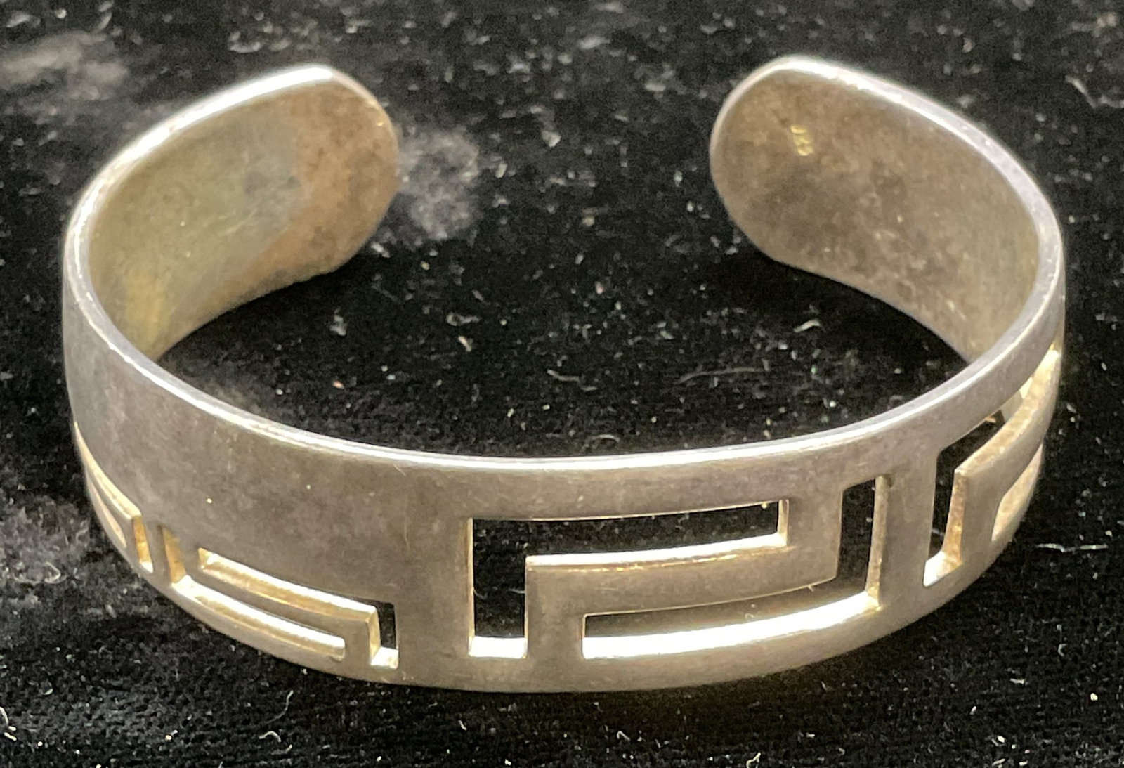 Vintage Sterling Silver Geometric Cuff Bracelet: Vintage sterling silver geometric cut out cuff bracelet. Marked sterling. Measures approx 2.25 inches wide. Total weight .74 ozt. Some scratching. Jewelry, estate jewelry, fine jewelry, cocktail jewel