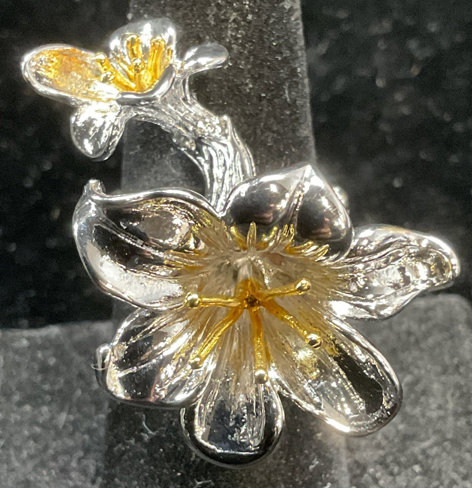 Silver & Gold Tone Flower Cocktail Ring NWT: Silver tone and gold tone flower motif cocktail ring. Size 6. New with tag. Some scratching. Jewelry, estate jewelry, costume jewelry, cocktail jewelry, fashion jewelry, accessories, fashion accessori