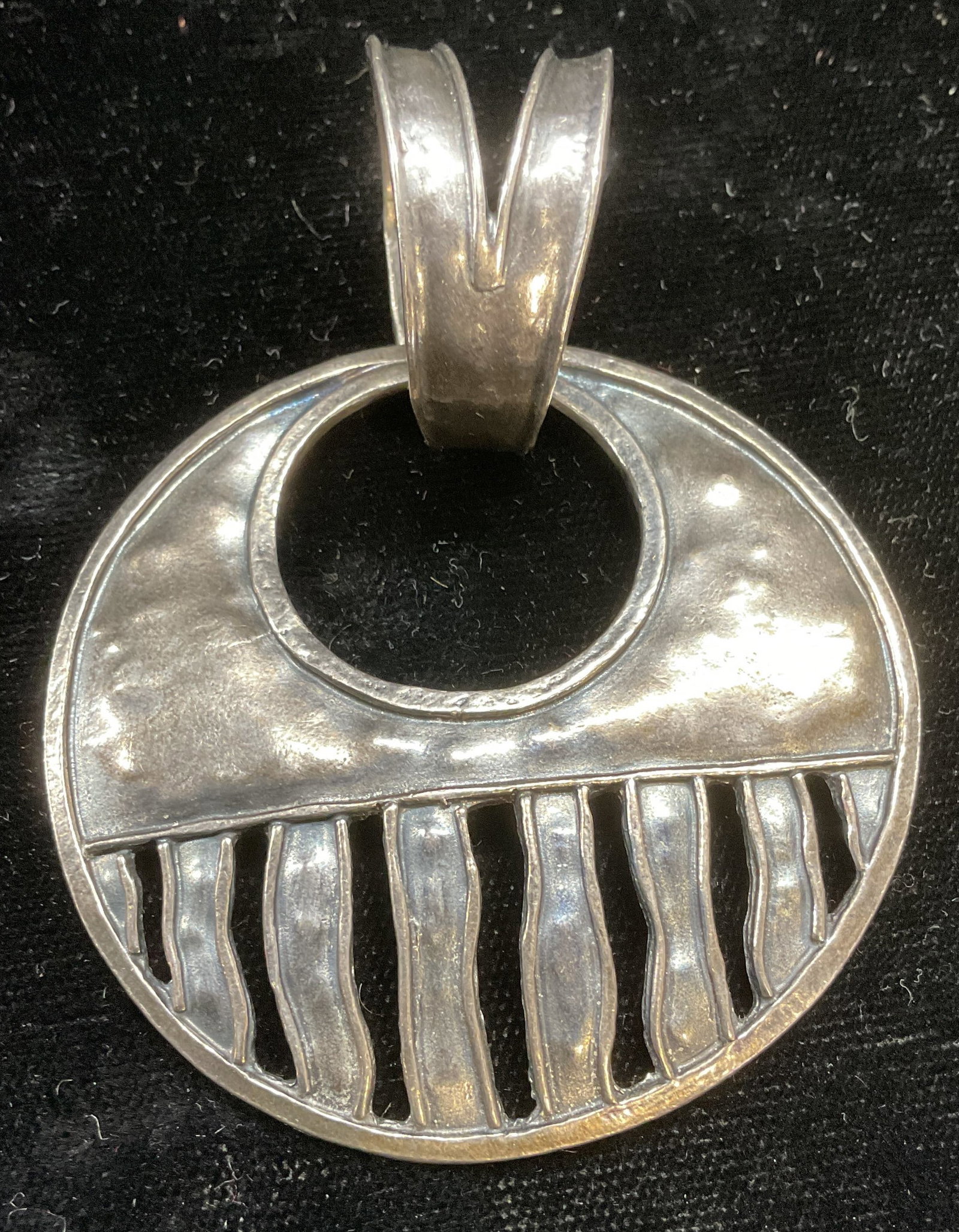Signed Sterling Silver Modernist Disc Pendant: Sterling silver modernist disc pendant. Marked sterling. Signed with makers mark. Measures approx 2 inches wide. Total weight .63 ozt. Some scratching. Jewelry, estate jewelry, fine jewelry, cocktail 