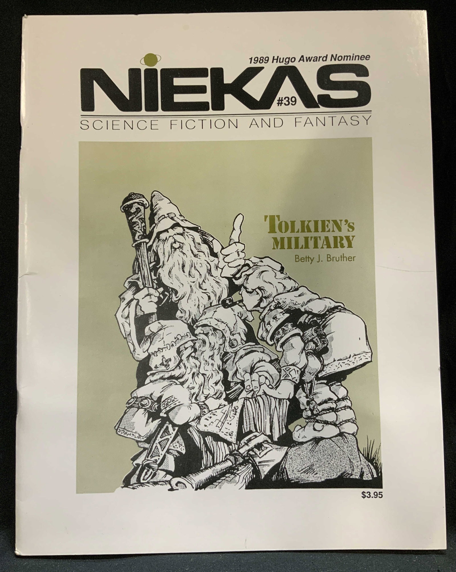 1989 Niekas #39 Science Fiction & Fantasy Fanzine: Science fiction and fantasy fanzine titled Niekas, specifically issue #39. Niekas. Magazine published in 1989 by Niekas Publications. June. 1989 Hugo Award Nominee. Features illustrations. Surface wea