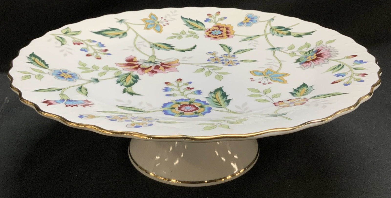Andrea by Sadek Buckingham Porc Cake Plate JAPAN: Porcelain cake plate has a Buckingham pattern, which features a multi-color floral design, scalloped edge & gold trim. Signed & marked. Reads, ANDREA BY SADEK. MADE IN JAPAN. Surface wear consistent t