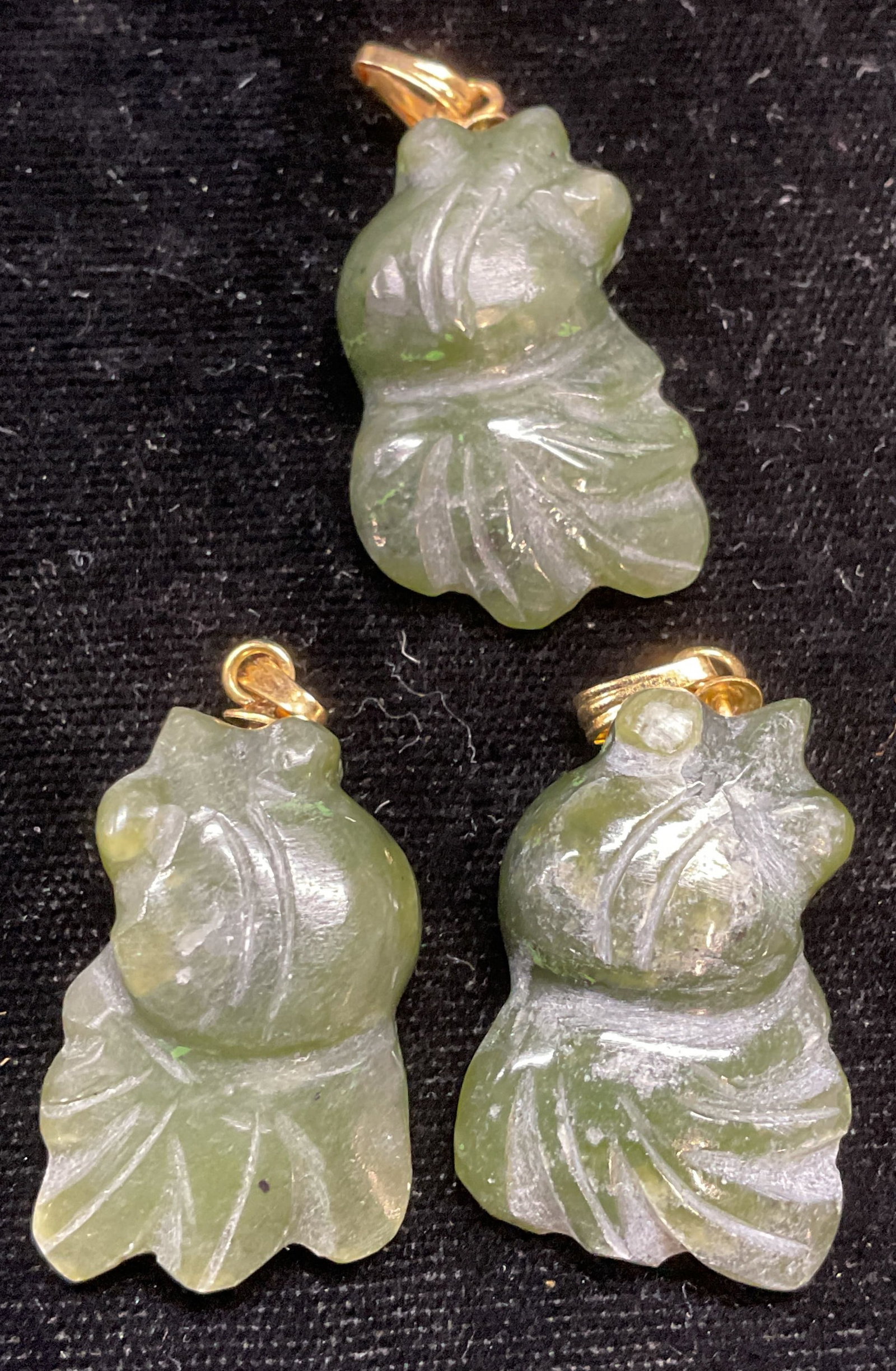 Lot 3 Carved Nephrite Jade Pendants: Lot of 3 hand carved nephrite jade pendants. Measure approx 1 x .75 inches. Some scratching. Jewelry, estate jewelry, semiprecious jewelry, cocktail jewelry, fashion jewelry, accessories, fashion acce